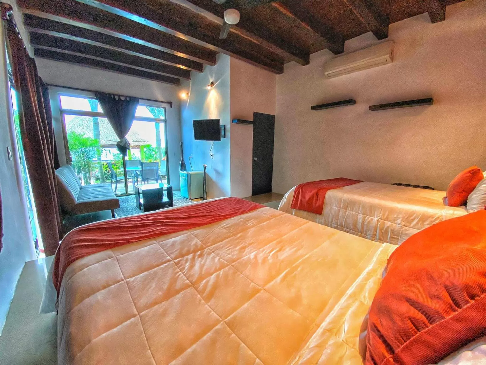 Quadruple Room with Lake View in Hotel Boutique Las Nubes Bacalar