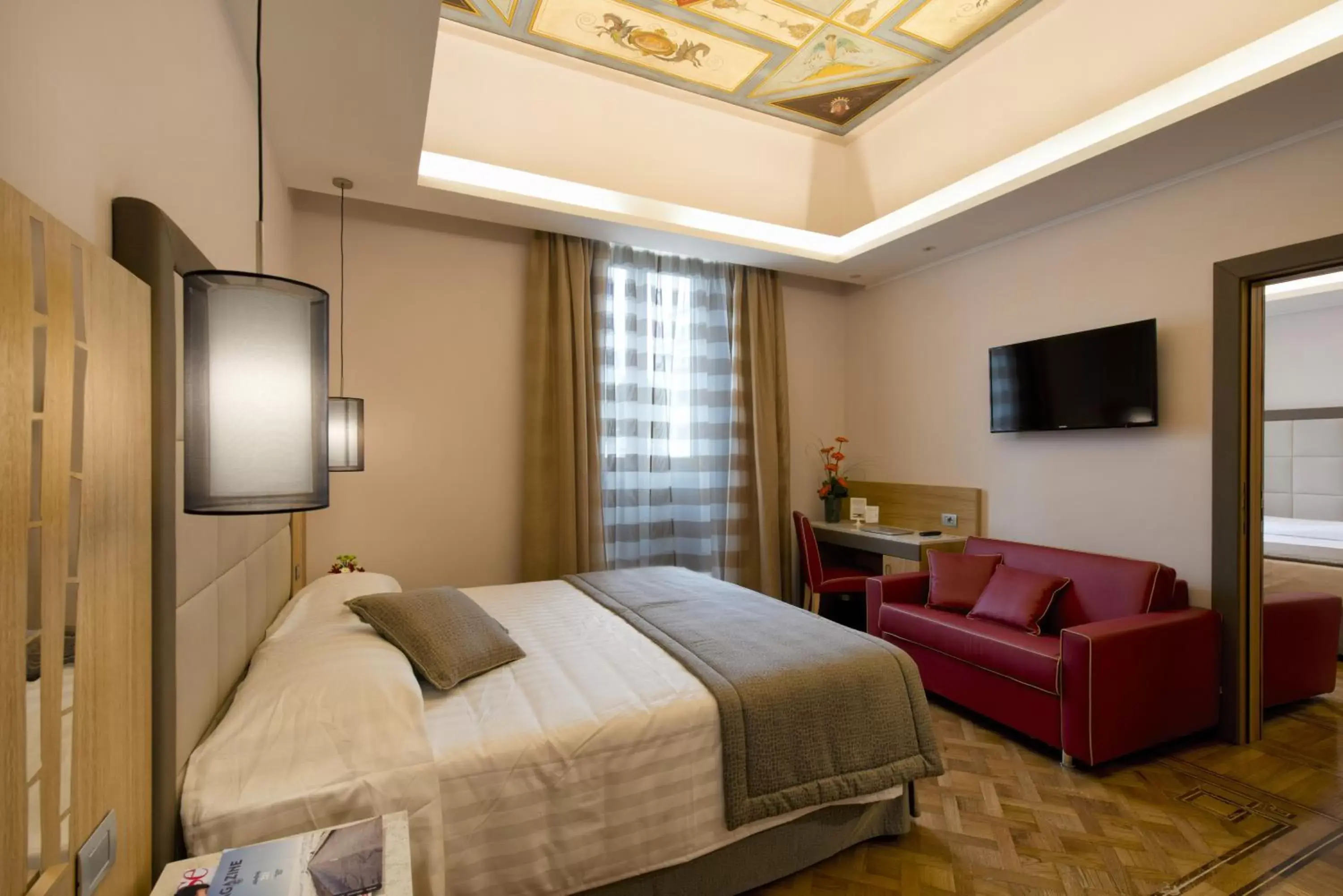 Photo of the whole room, TV/Entertainment Center in Hotel Giolli Nazionale
