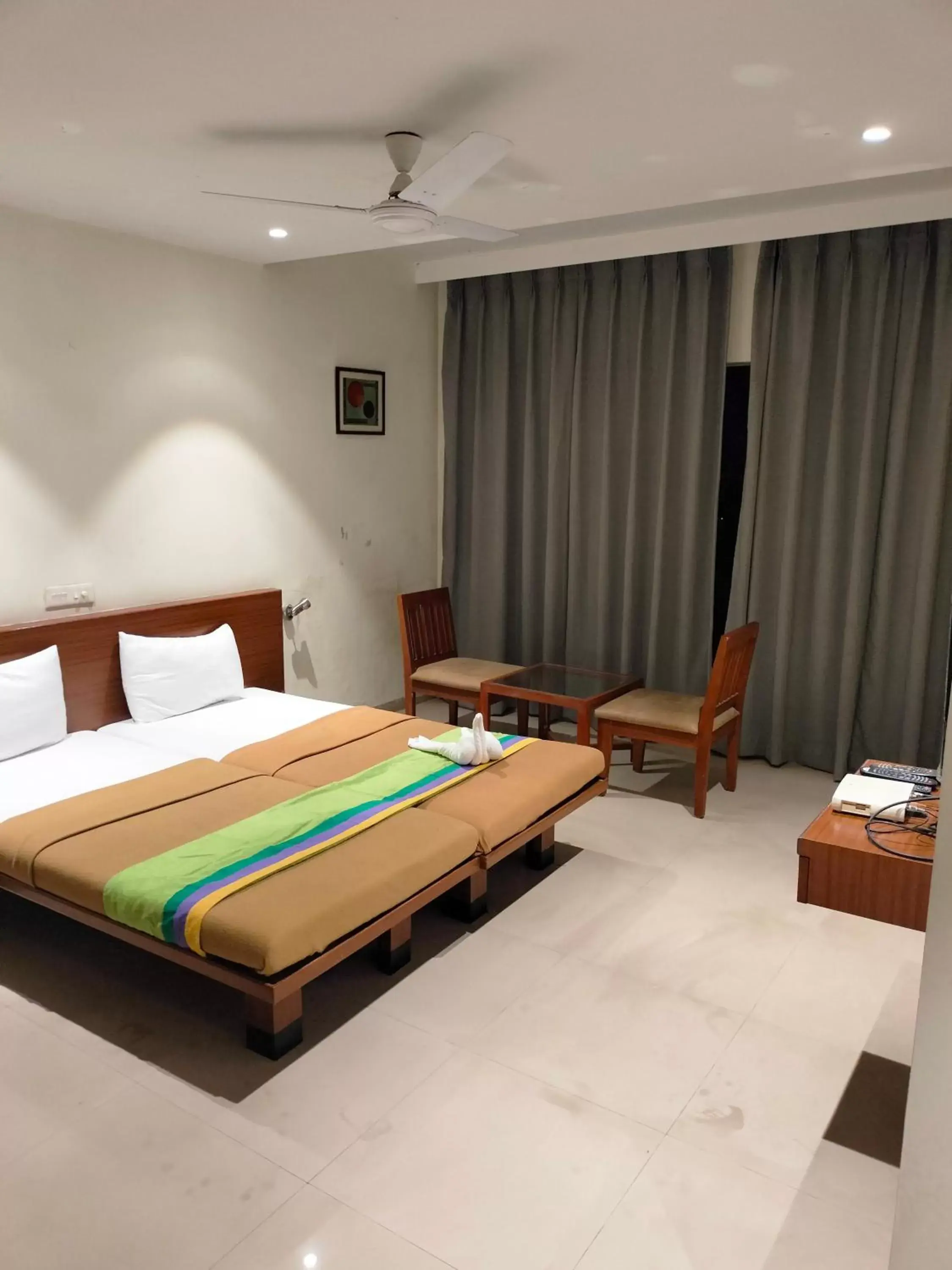 Bed in Hotel Sumanchandra Suites Bed in Hotel Sumanchandra Suites