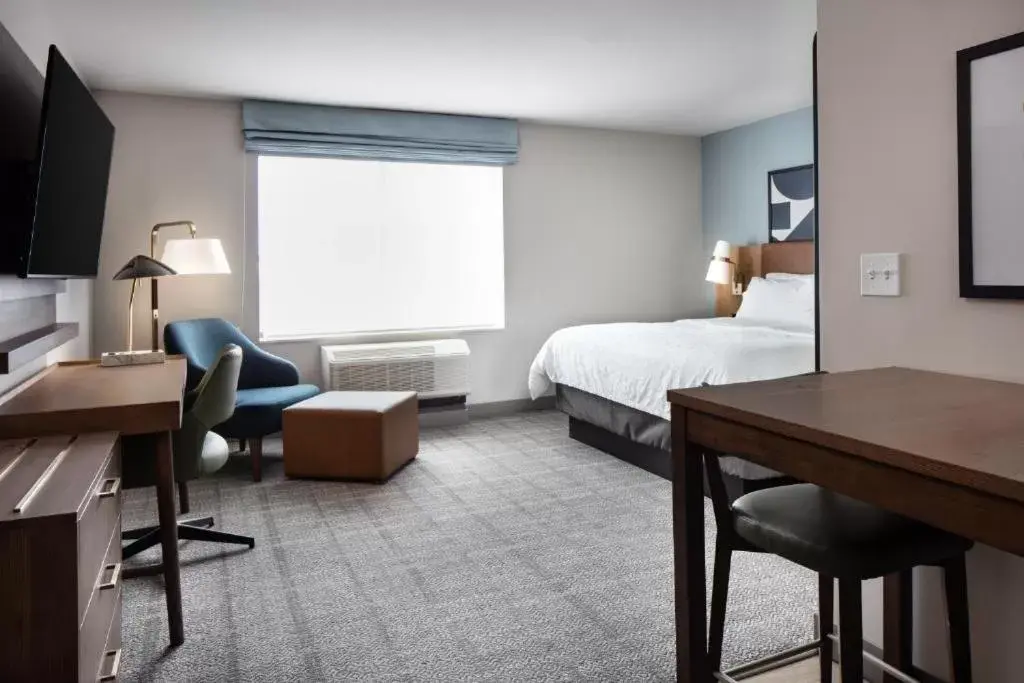 Bed in Staybridge Suites - Iowa City - Coralville, an IHG Hotel