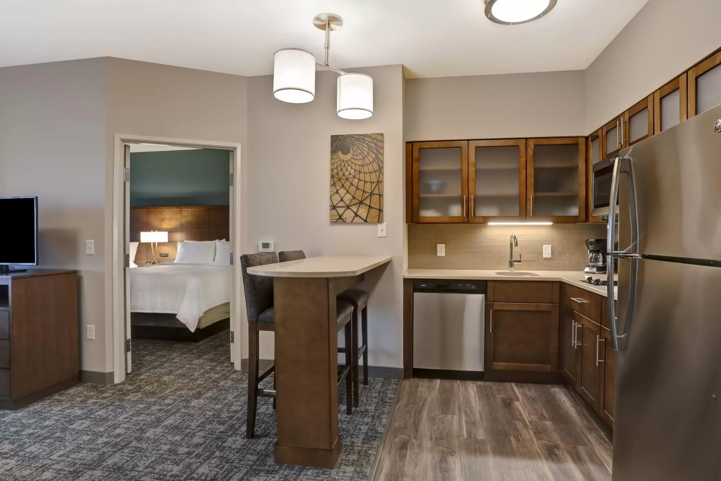 Photo of the whole room, Kitchen/Kitchenette in Staybridge Suites - Overland Park - Kansas City S, an IHG Hotel