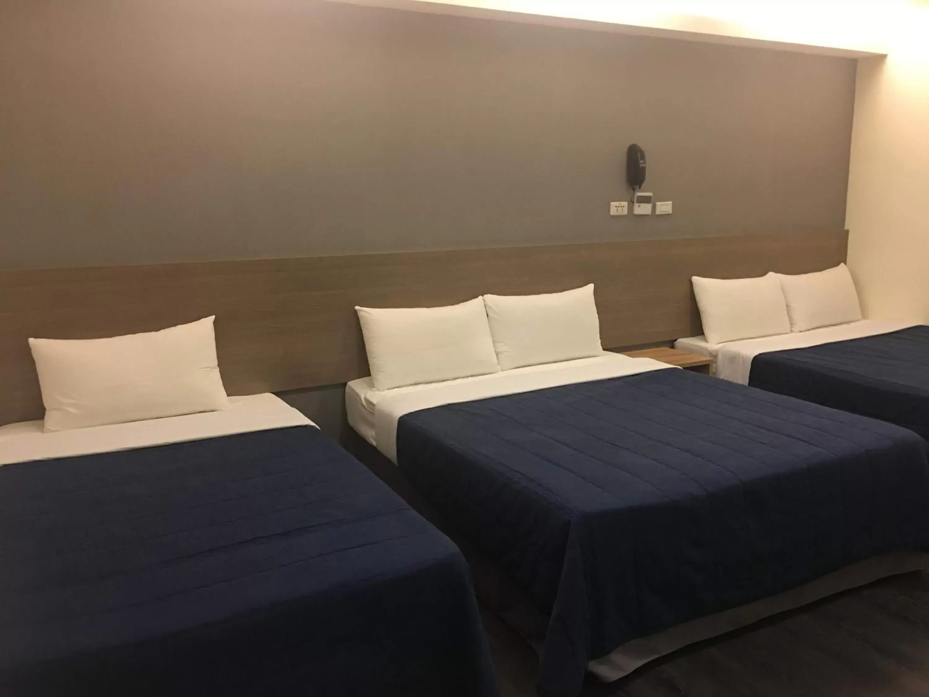 Bed in Bulowan Hotel