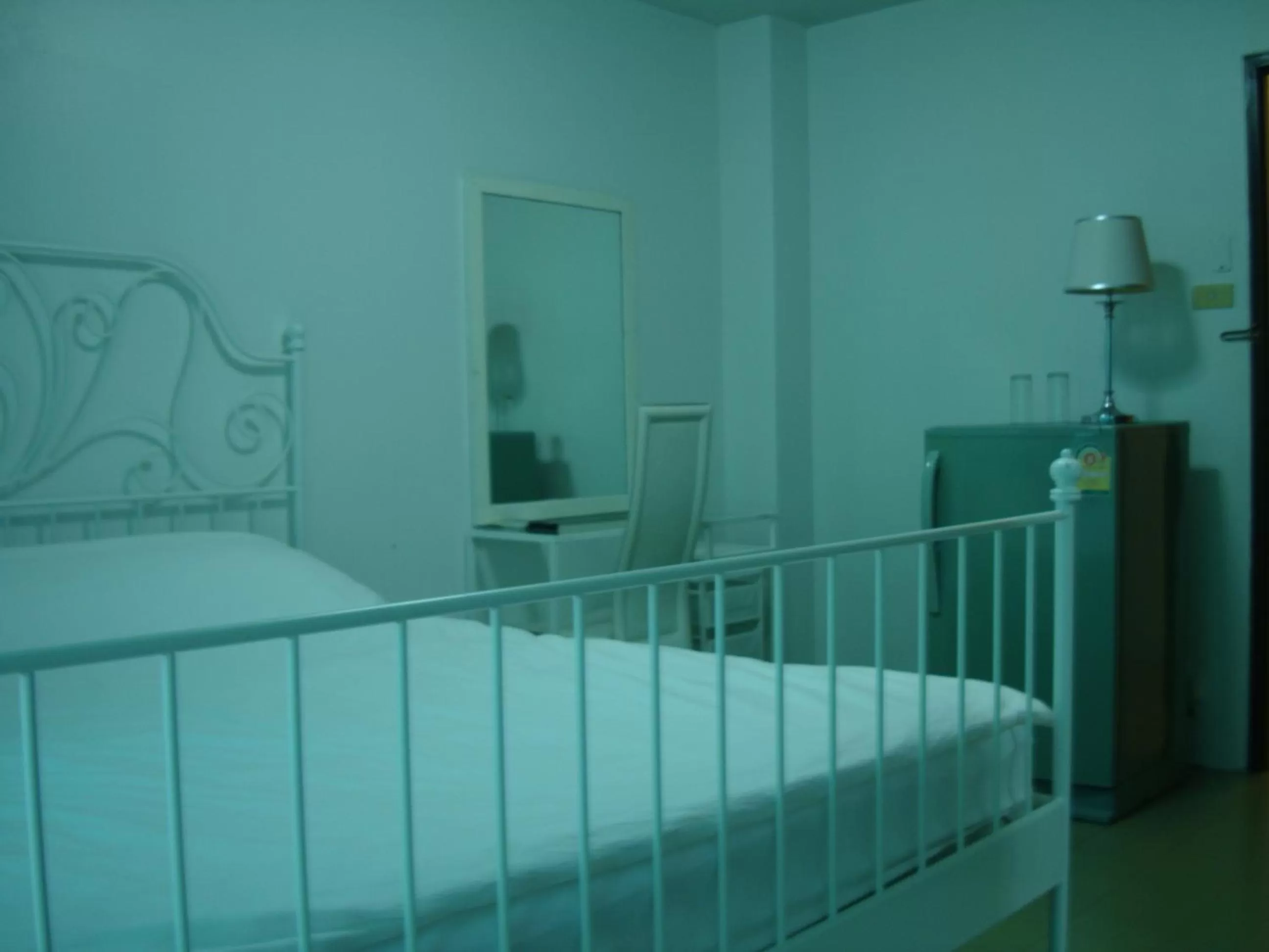 Bed in Oriental Smile Hotel