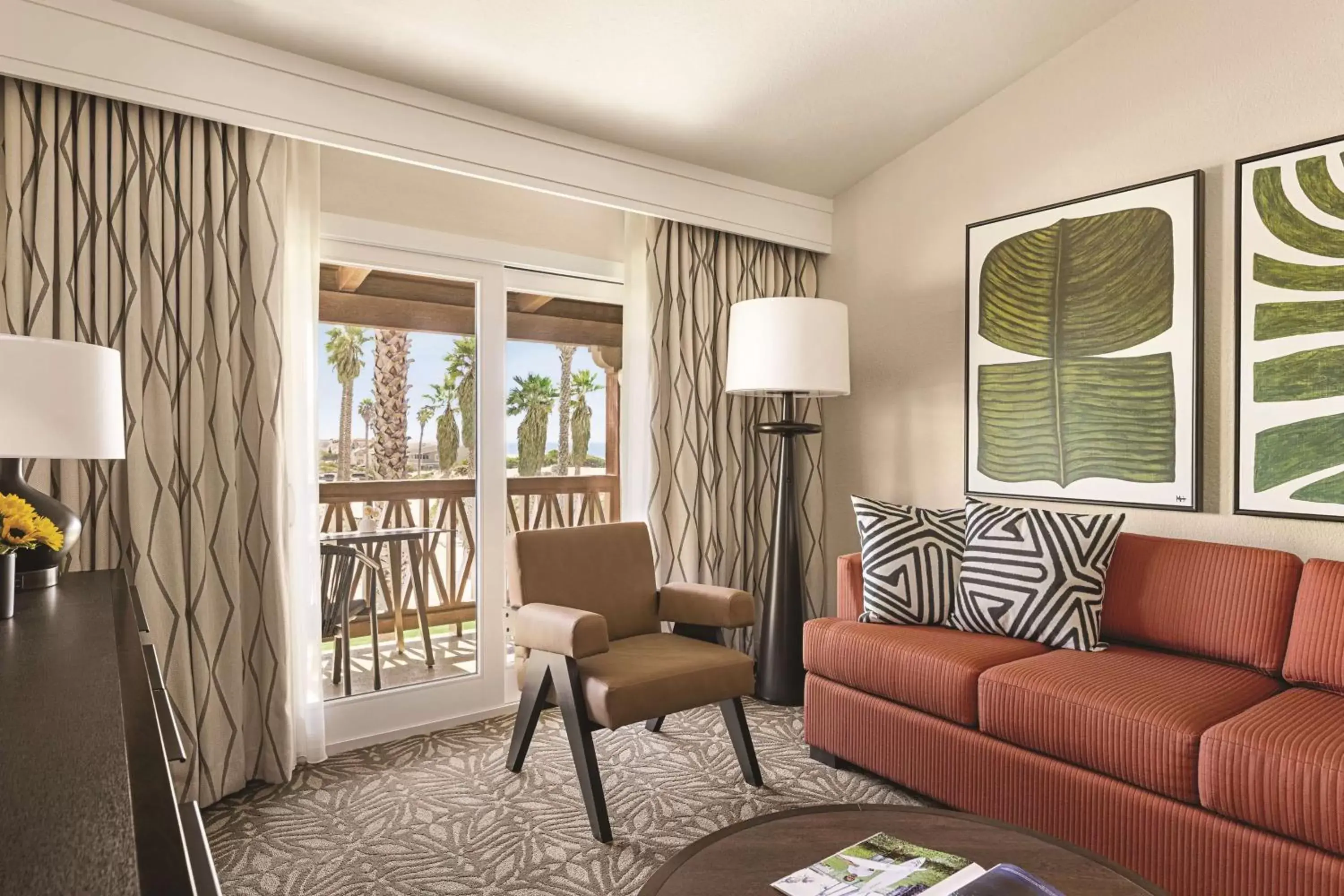 Living room, Seating Area in Zachari Dunes on Mandalay Beach, Curio Collection by Hilton