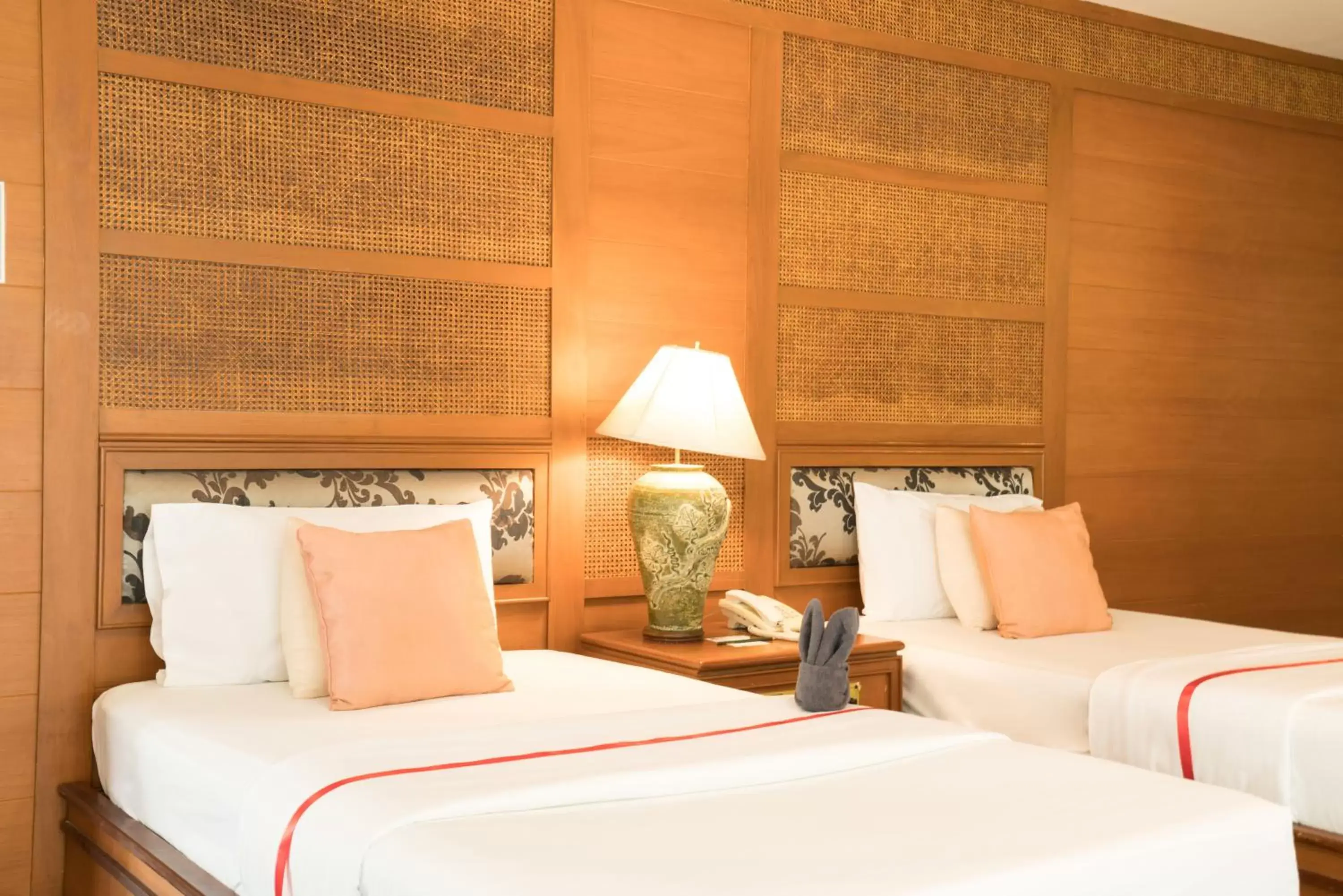 Bed in Grand Jomtien Palace Hotel - SHA Extra Plus