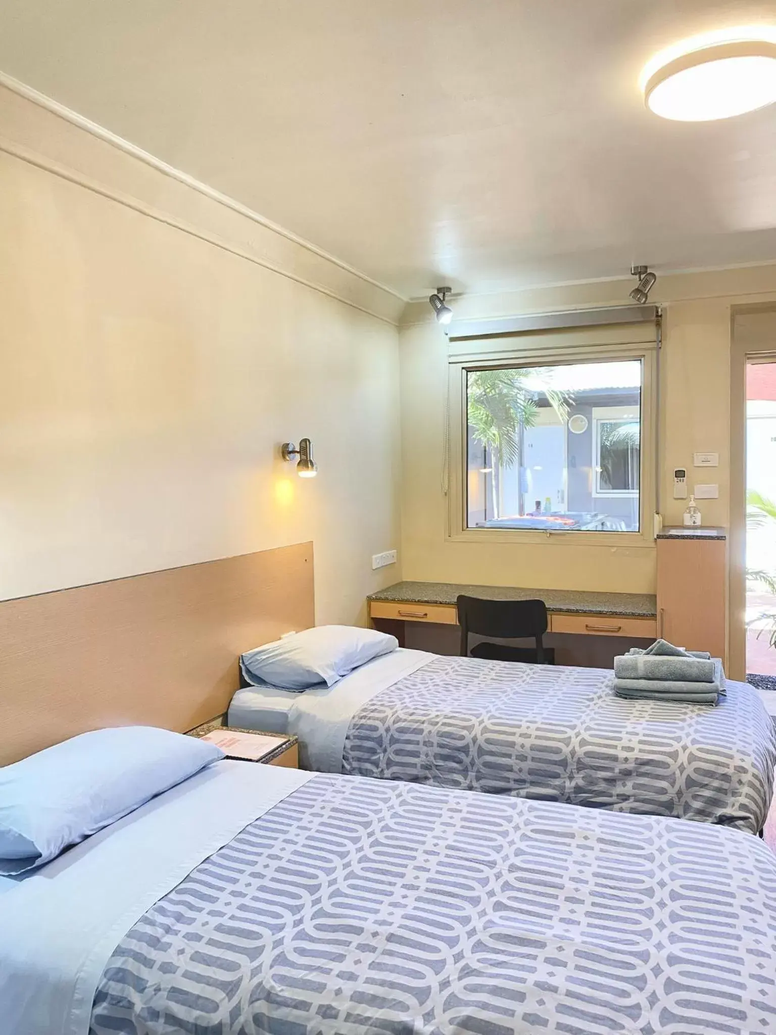Photo of the whole room, Bed in Econo Lodge Karratha (formerly Karratha Motel)