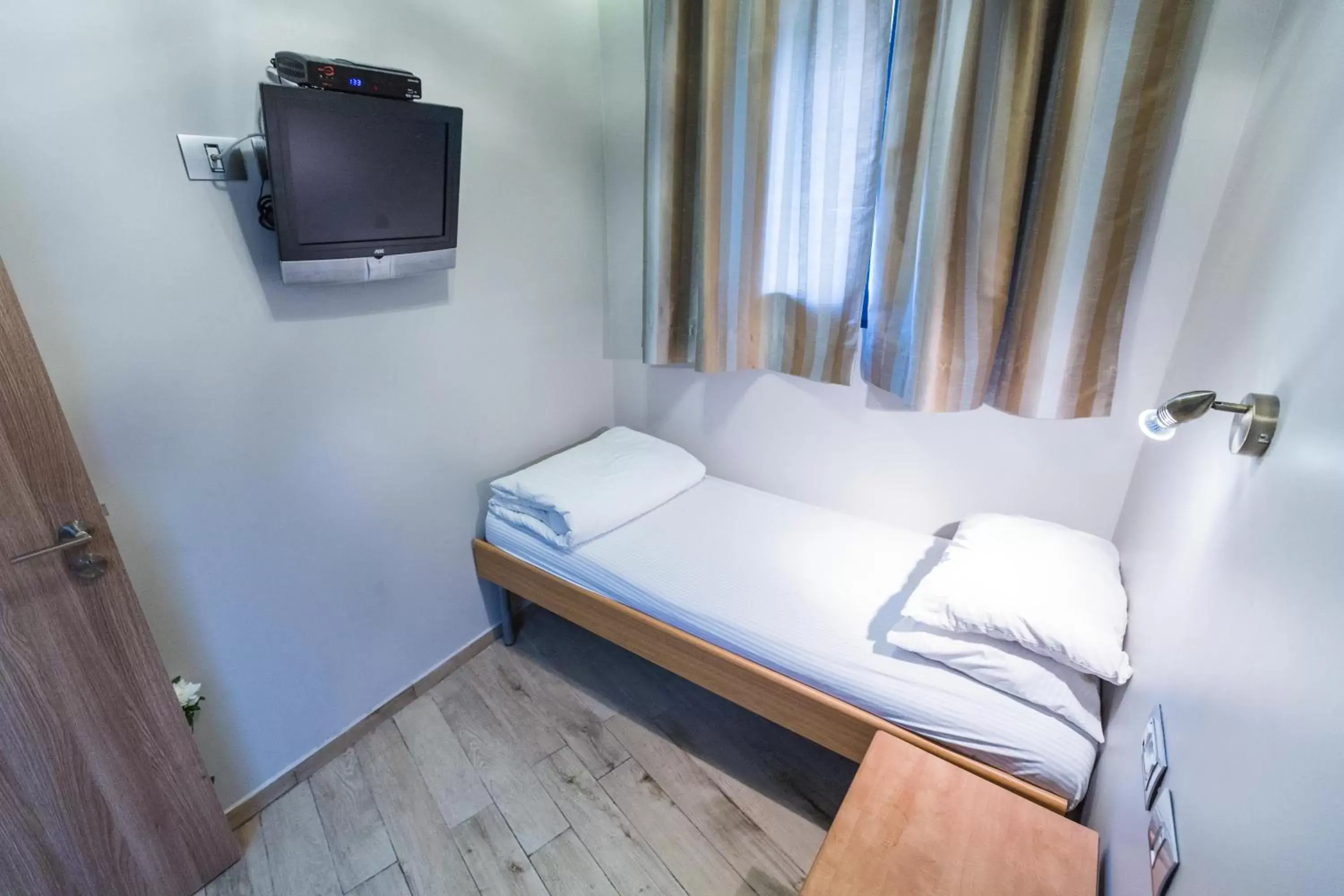 Bed in Kaplan Hotel Bed in Kaplan Hotel