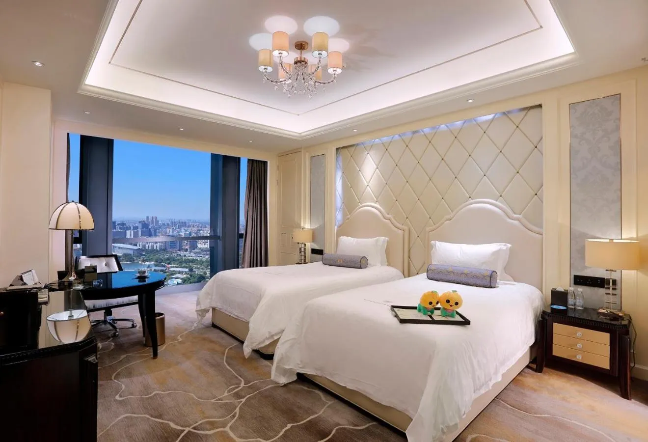 Bed in Dongguan Kande International Hotel