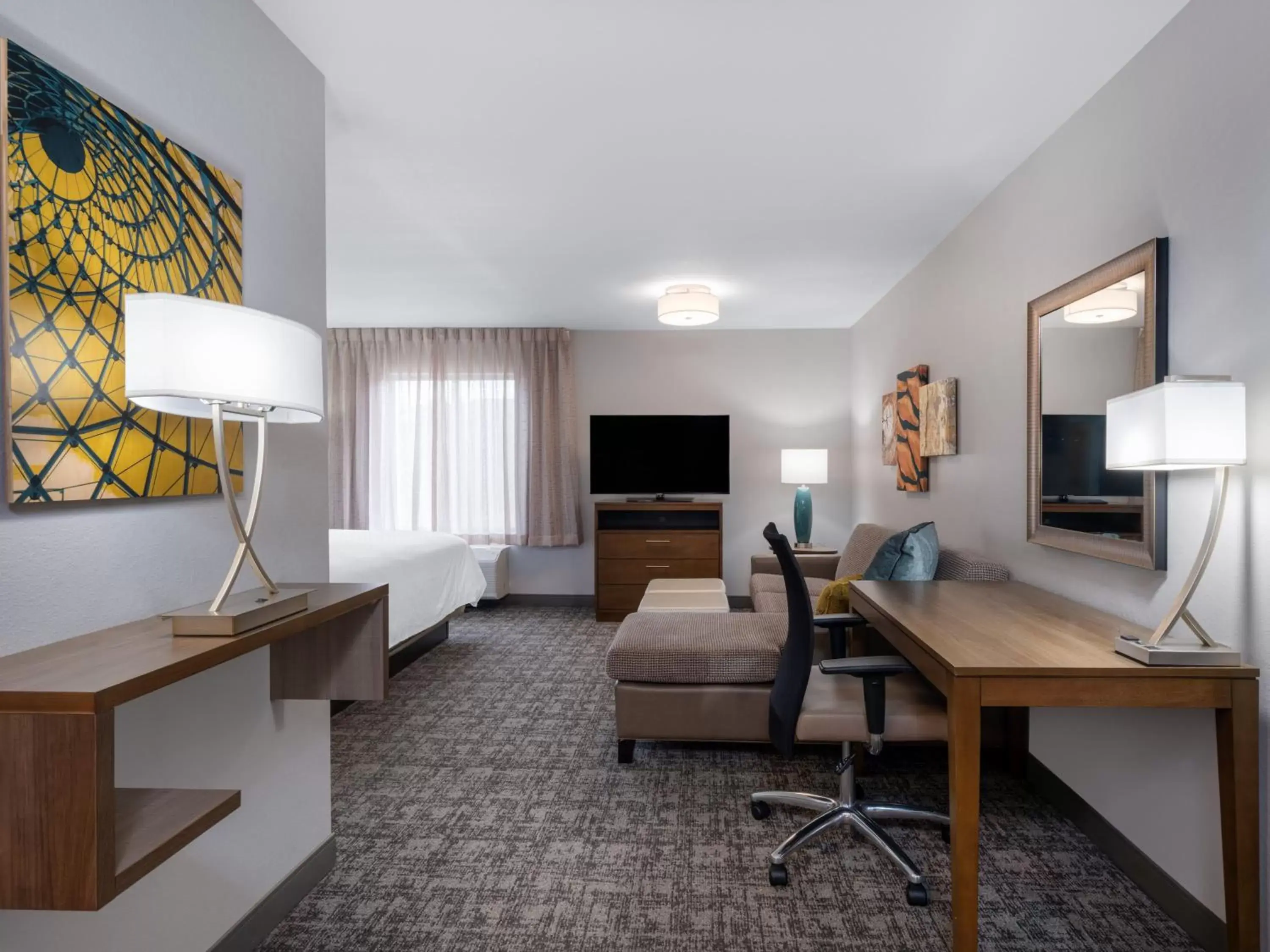 Photo of the whole room, TV/Entertainment Center in Staybridge Suites - Sioux City Southeast, an IHG Hotel