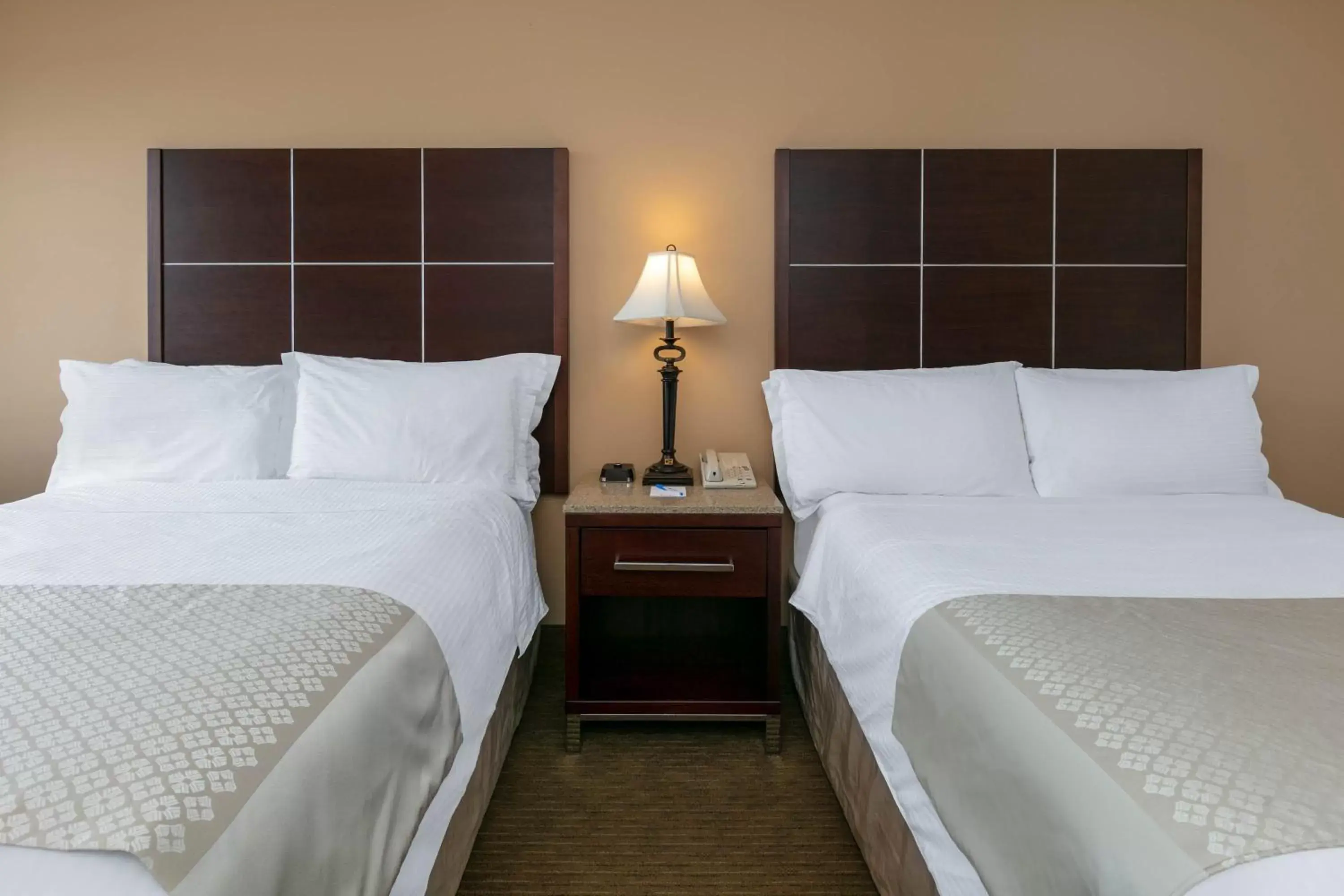 Bed in Wyndham Riverfront Hotel