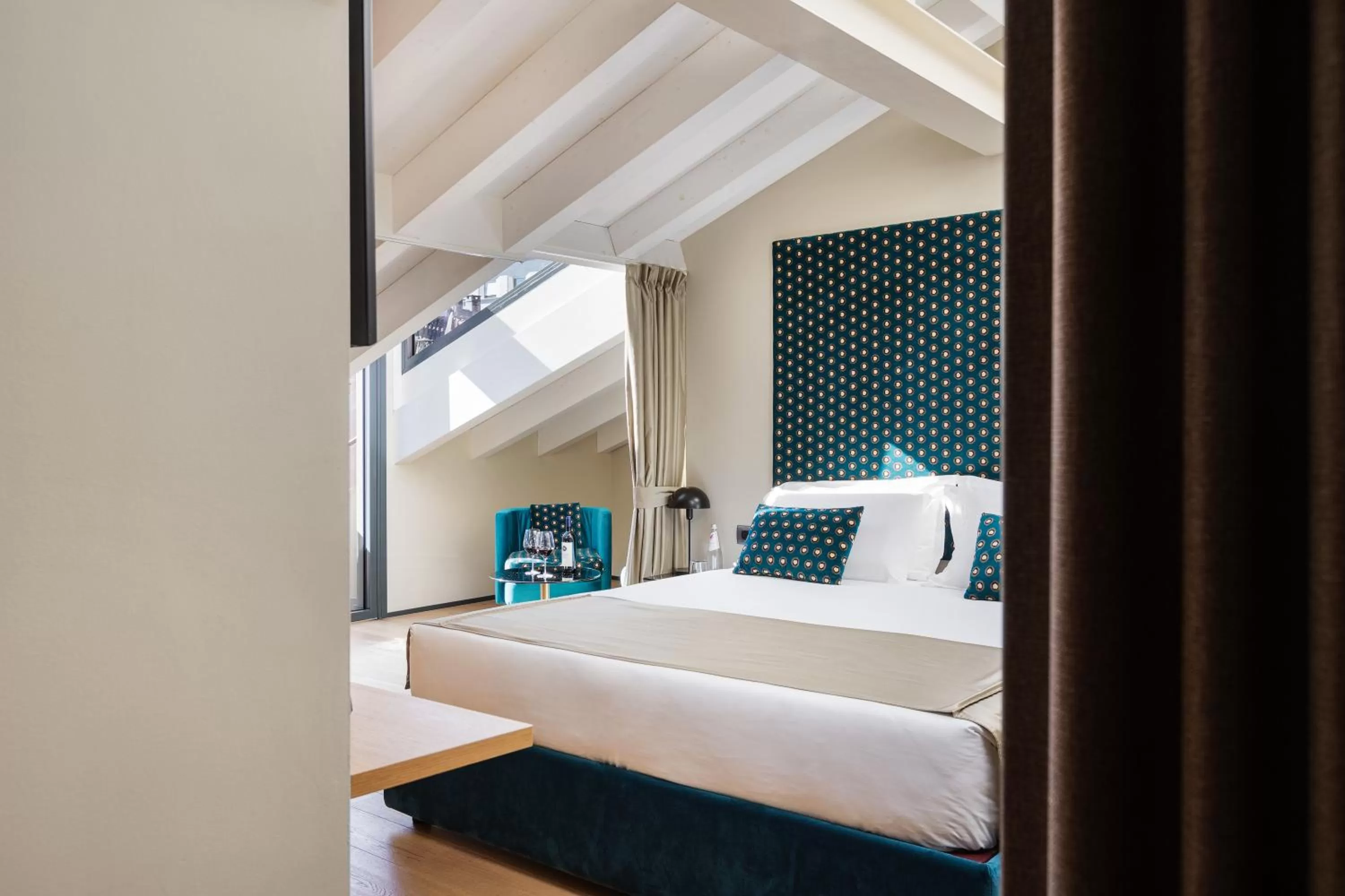 Bed in Speronari Suites