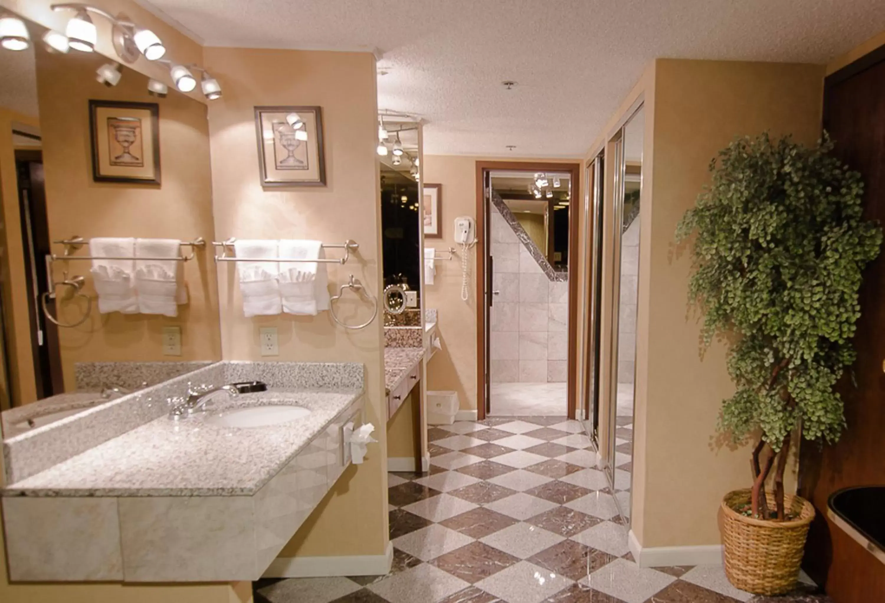 Bathroom in SureStay Plus Hotel by Best Western Reno Airport