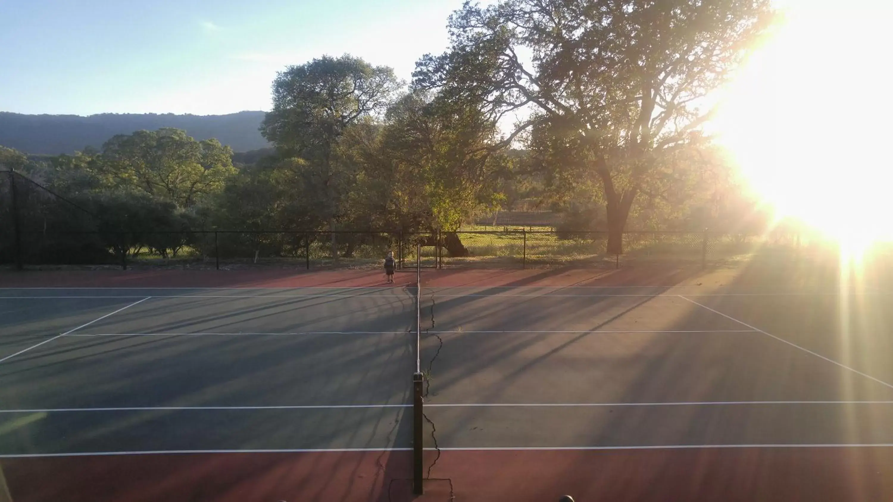 Tennis court in Beltane Ranch