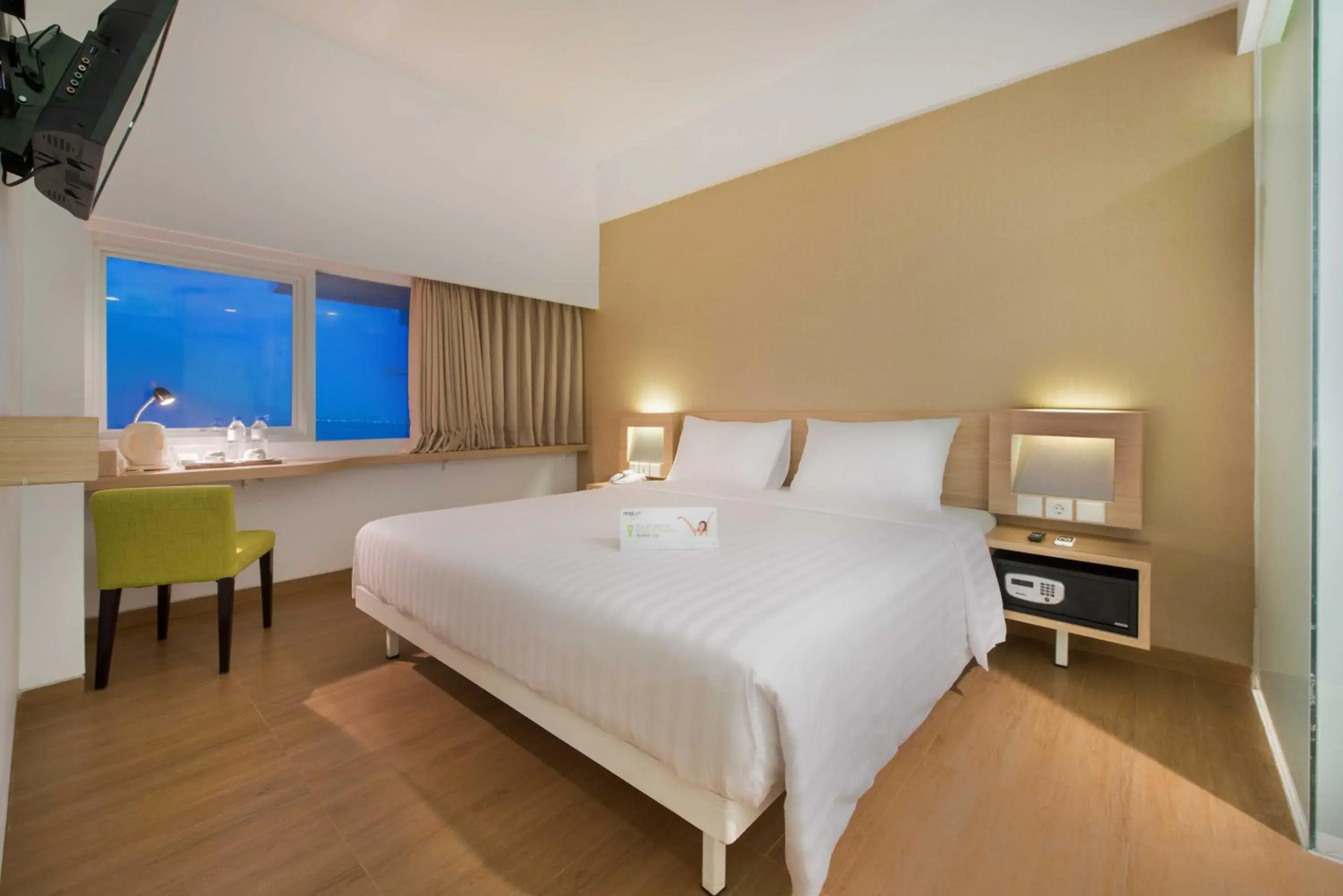 Bed in Whiz Prime Hotel Megamas Manado