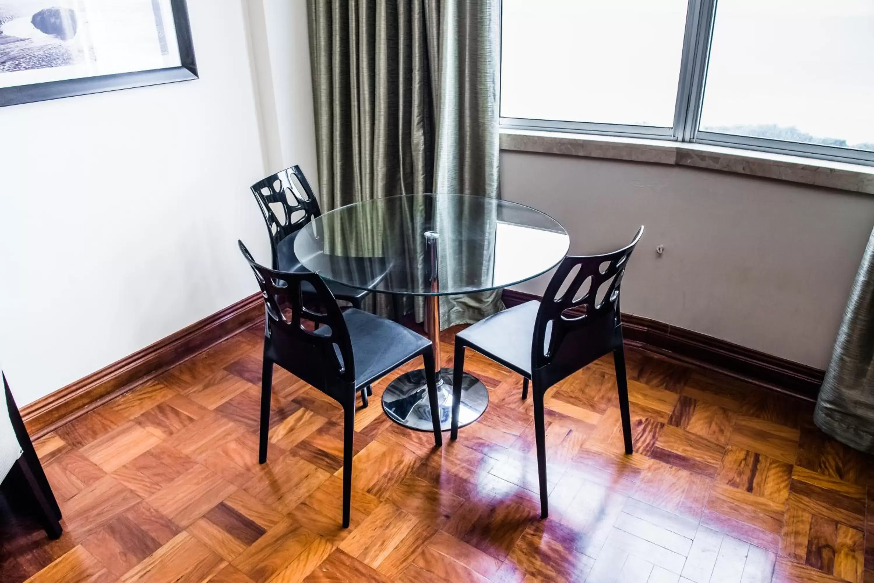 Dining Area in Belaire Suites Hotel