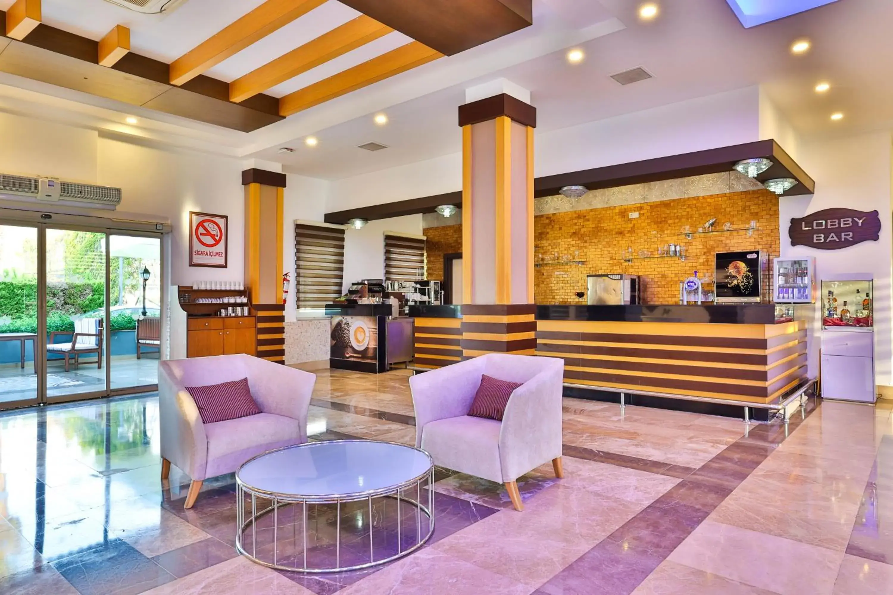 Lounge or bar, Lobby/Reception in Crystal Aura Beach Resort & Spa