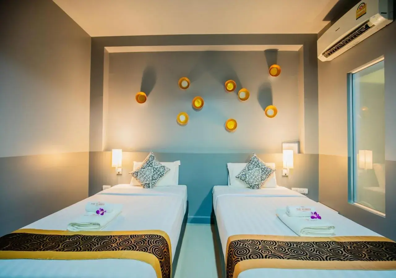 Bed in The Rubber Hotel Phuket Bed in The Rubber Hotel Phuket