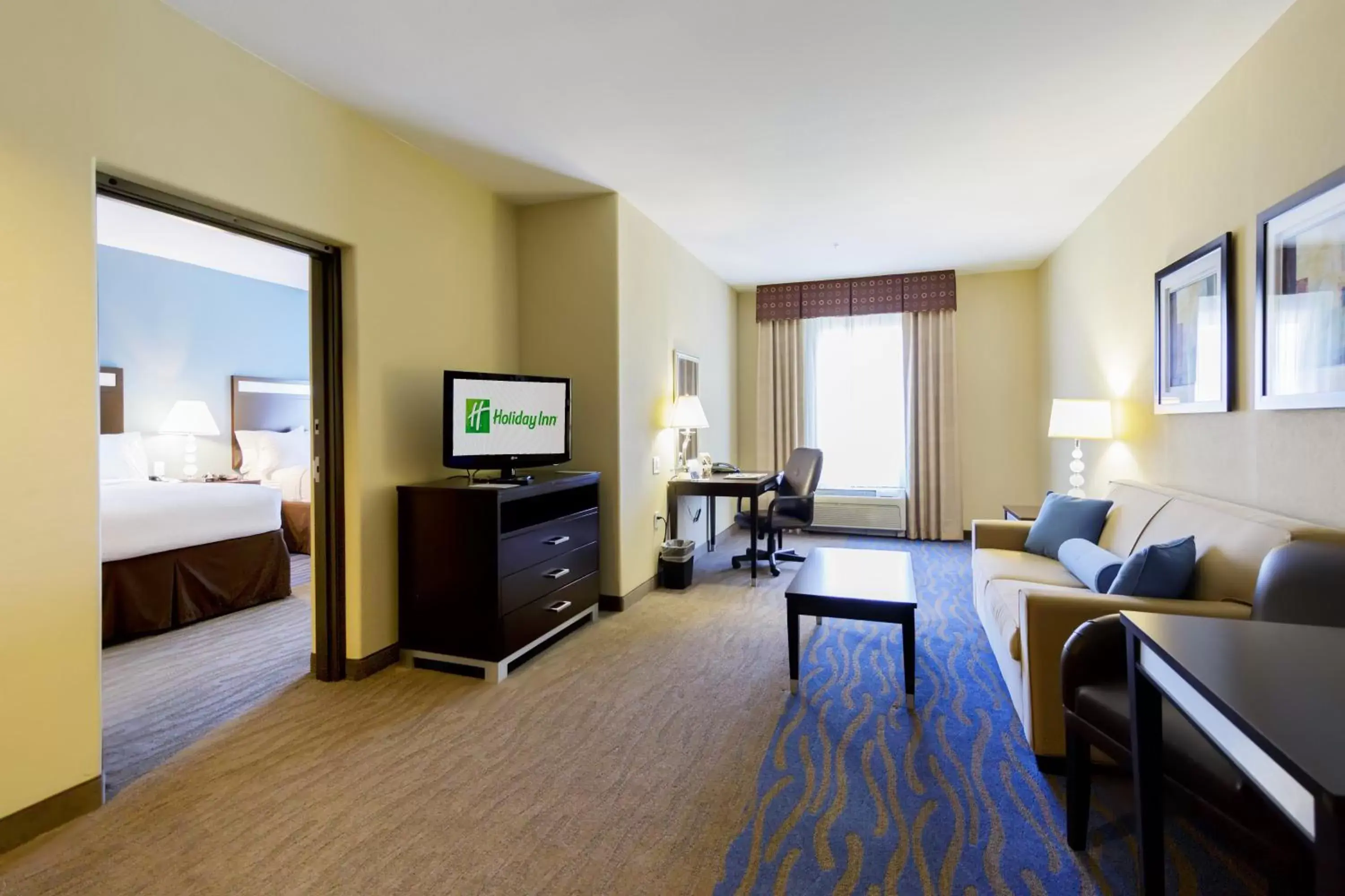 Photo of the whole room, TV/Entertainment Center in Holiday Inn Houston-Webster, an IHG Hotel