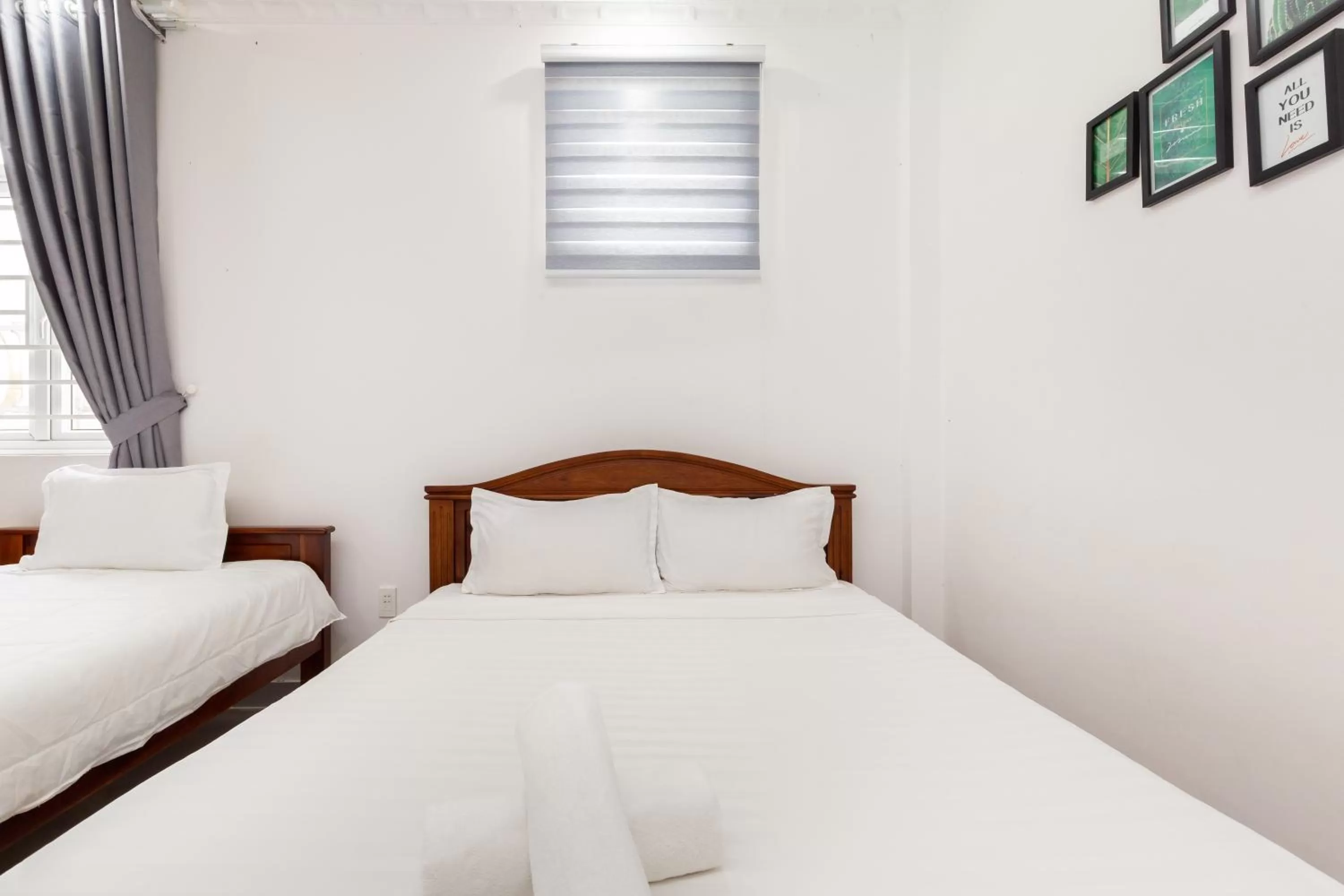 Bed in Luxury Vườn Lài Hotel