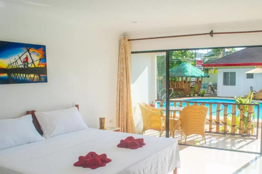 Bed in Alona Vida Beach Hill Resort