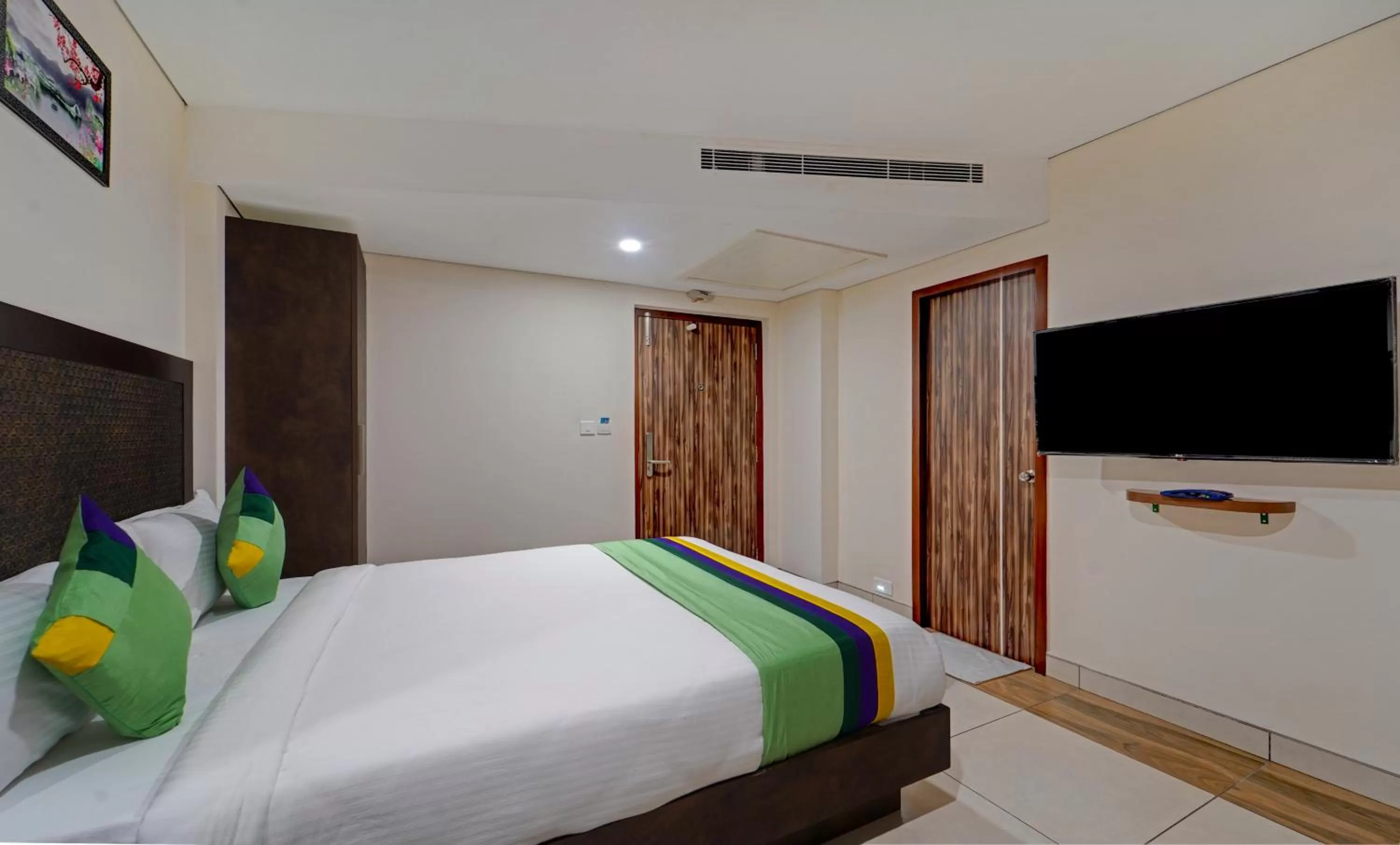 Bed in Treebo Vetri Supreme Residency