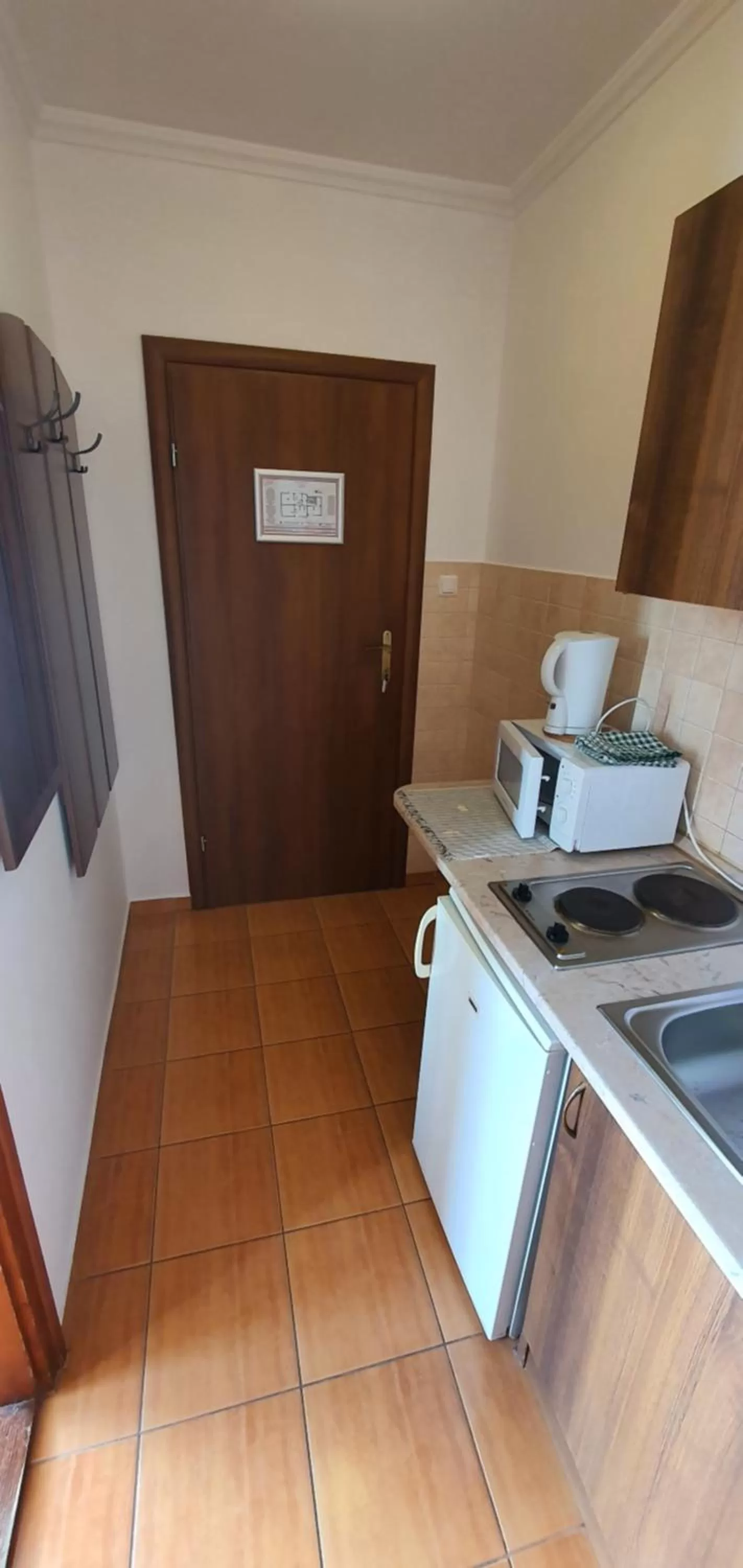 Kitchen/Kitchenette in Aqua Oazis Apartman