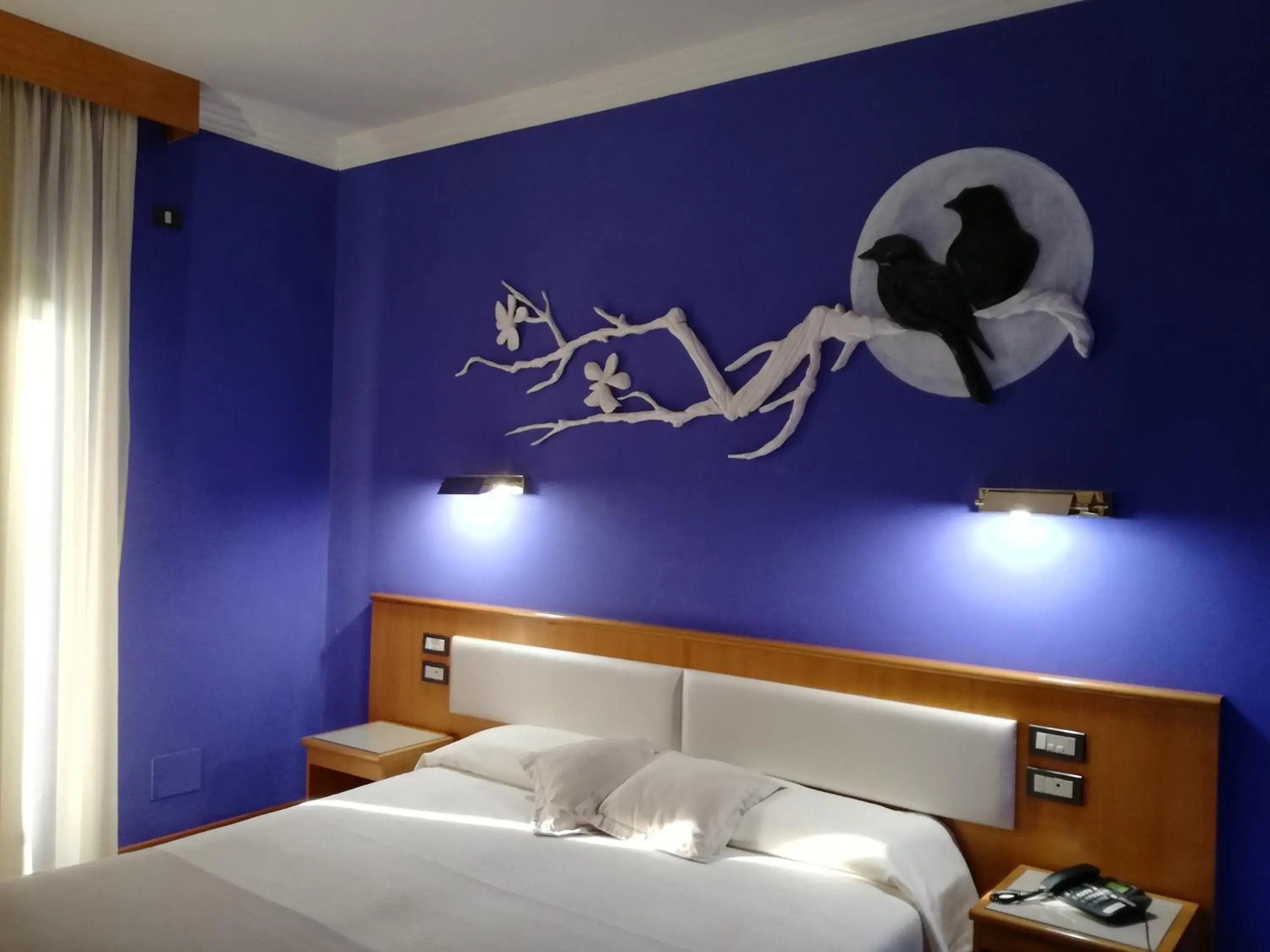 Bed in FILIPPONE HOTEL&RISTORANTE