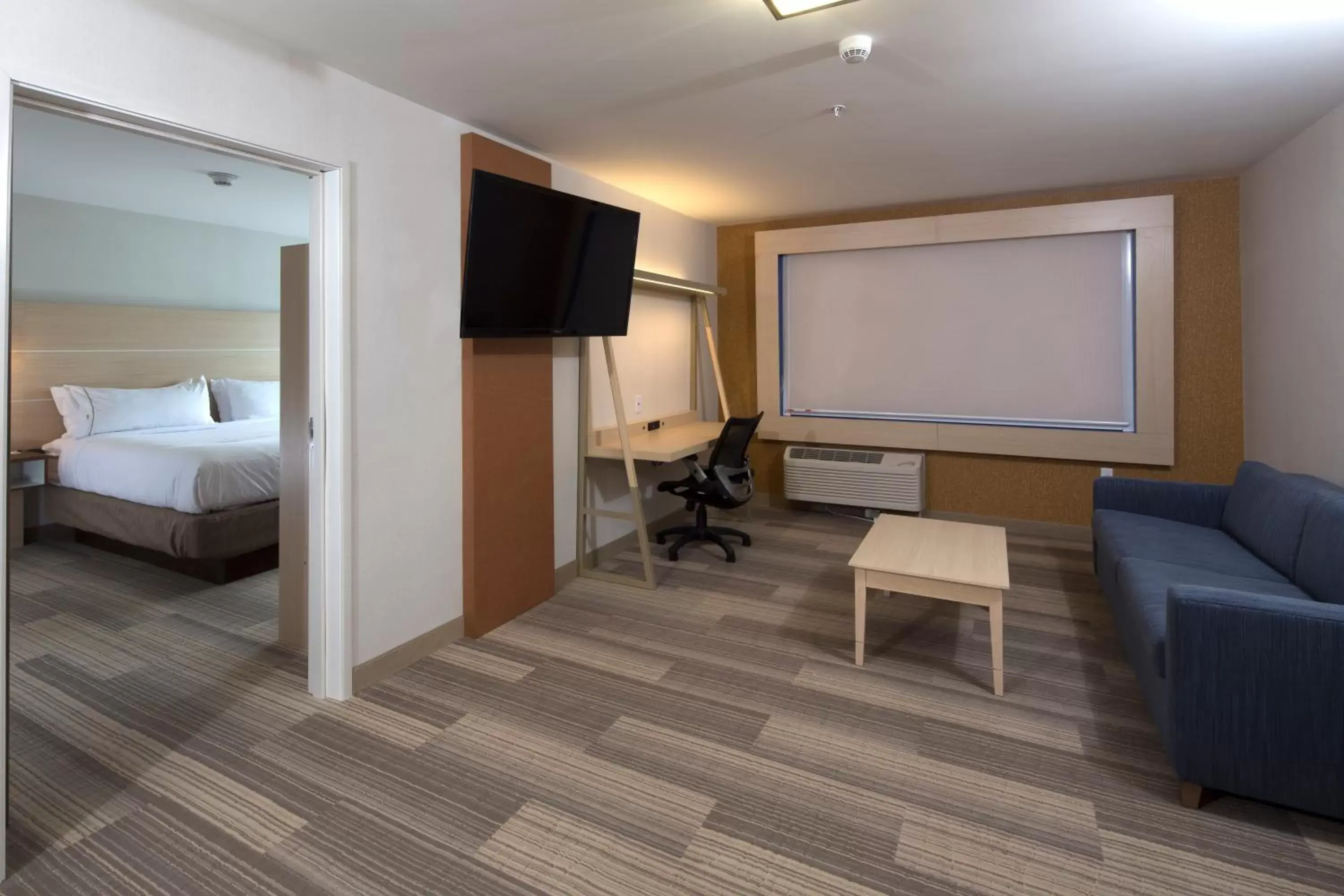 Bedroom, TV/Entertainment Center in Holiday Inn Express & Suites Monroe, an IHG Hotel