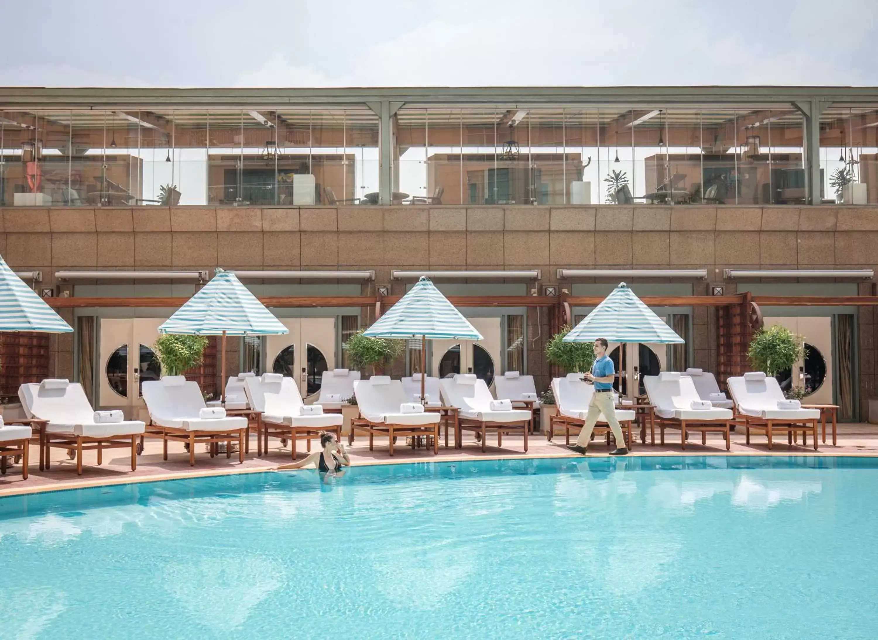 Swimming pool, Property Building in Four Seasons Hotel Cairo at Nile Plaza