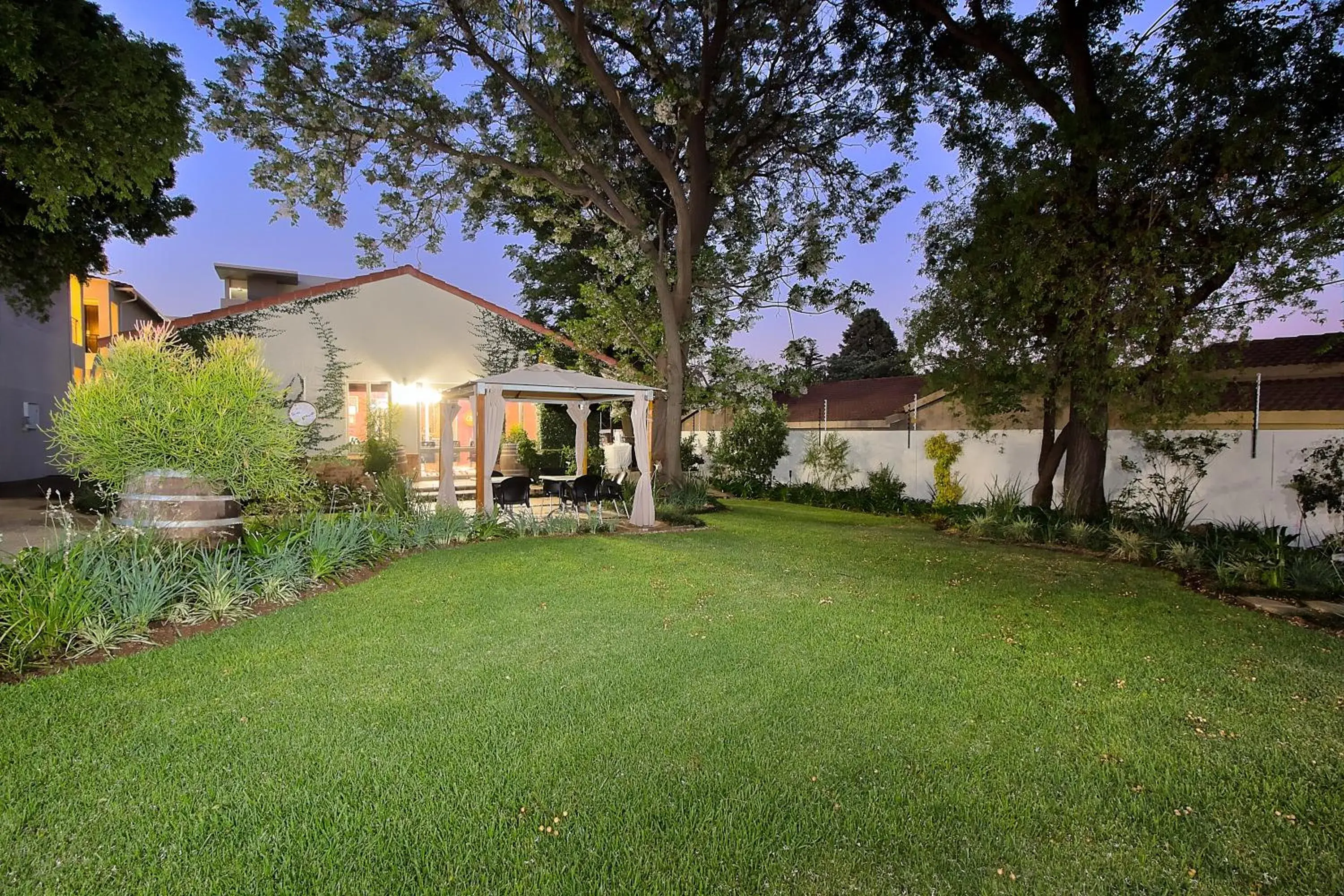 Garden, Property Building in The Syrene Boutique Hotel