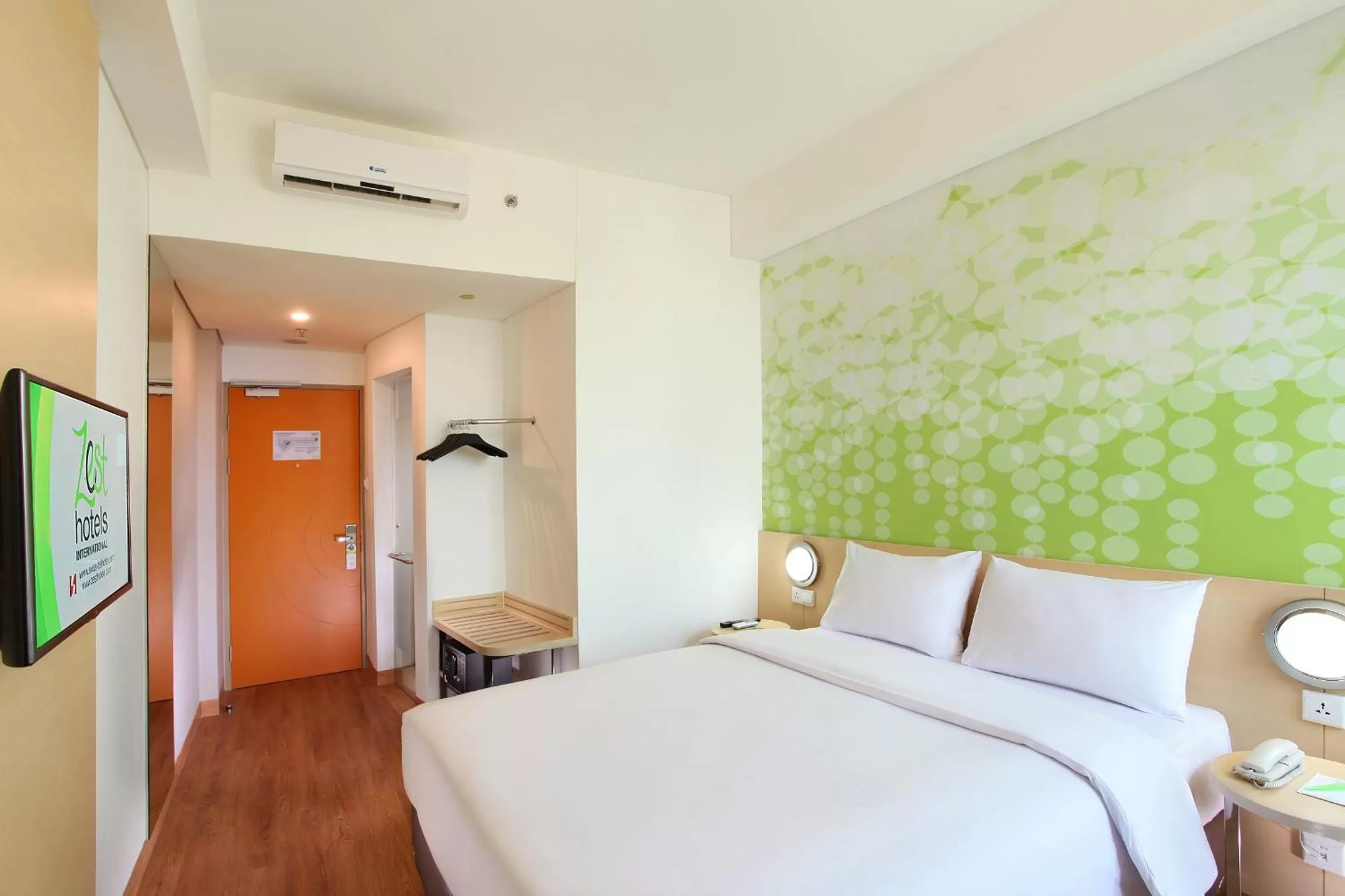 Bed in Zest Airport Jakarta by Swiss-Belhotel International