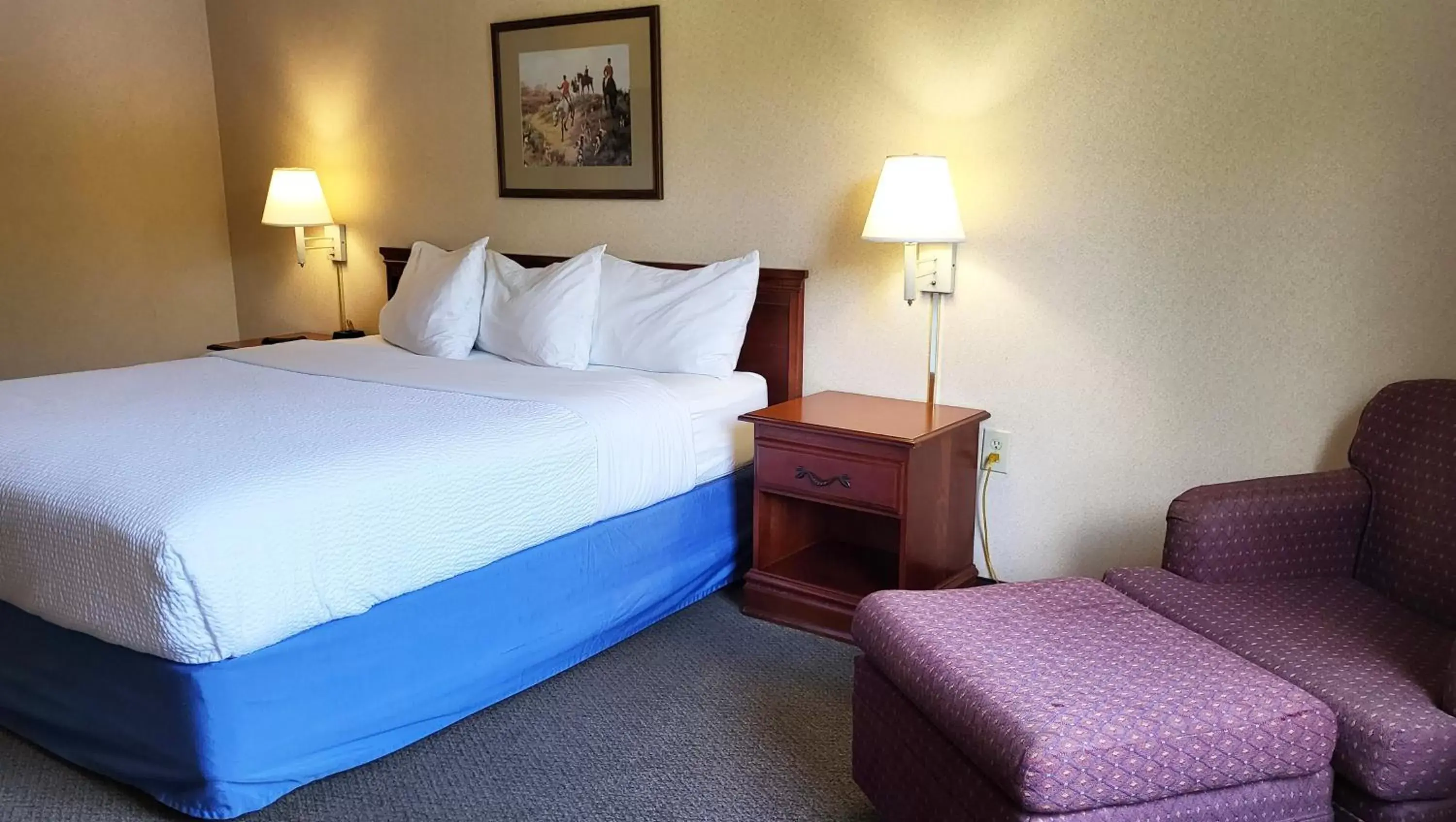 Photo of the whole room, Bed in Magnuson Hotel West Liberty