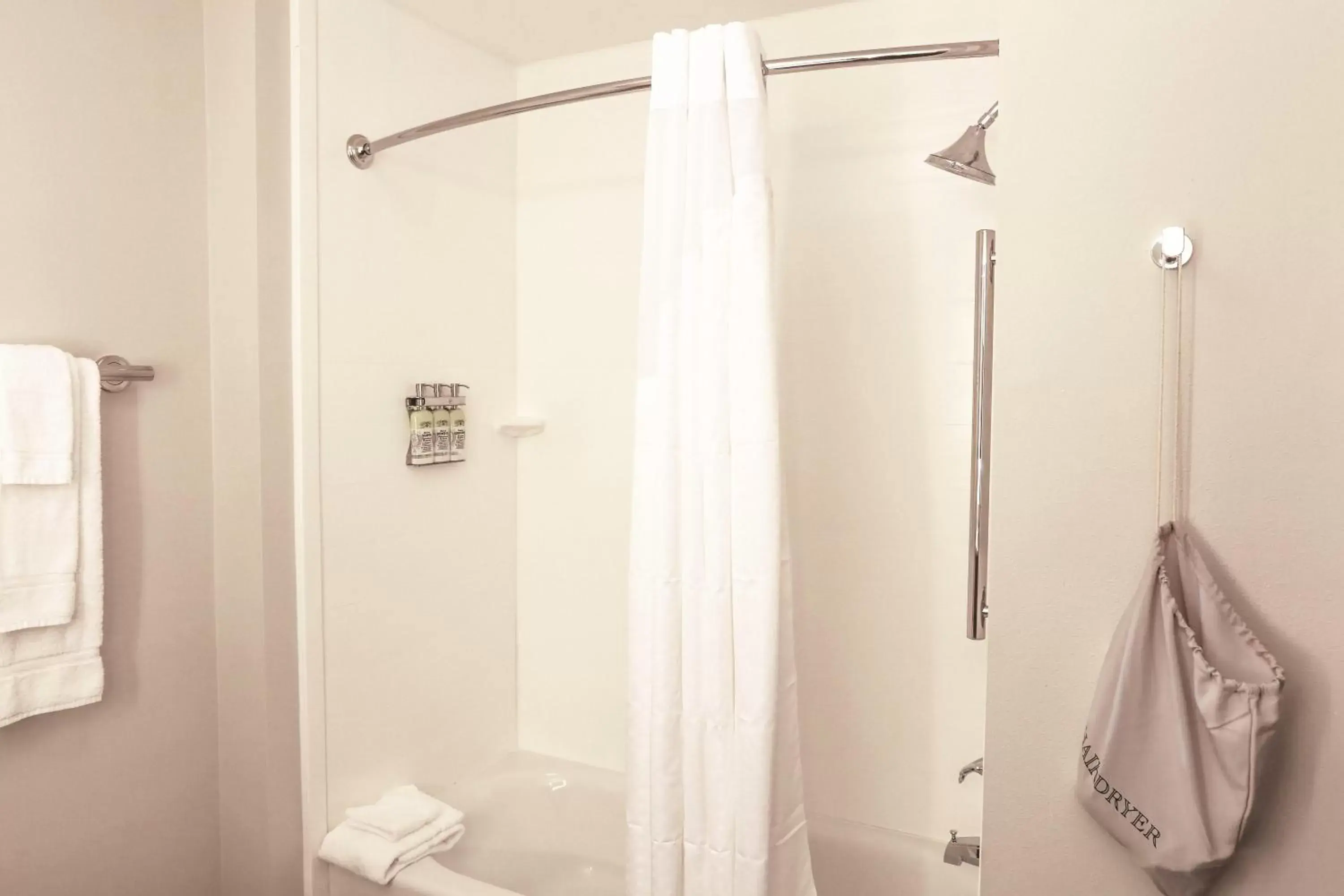 Bedroom, Bathroom in Holiday Inn Express & Suites - Houston IAH - Beltway 8, an IHG Hotel