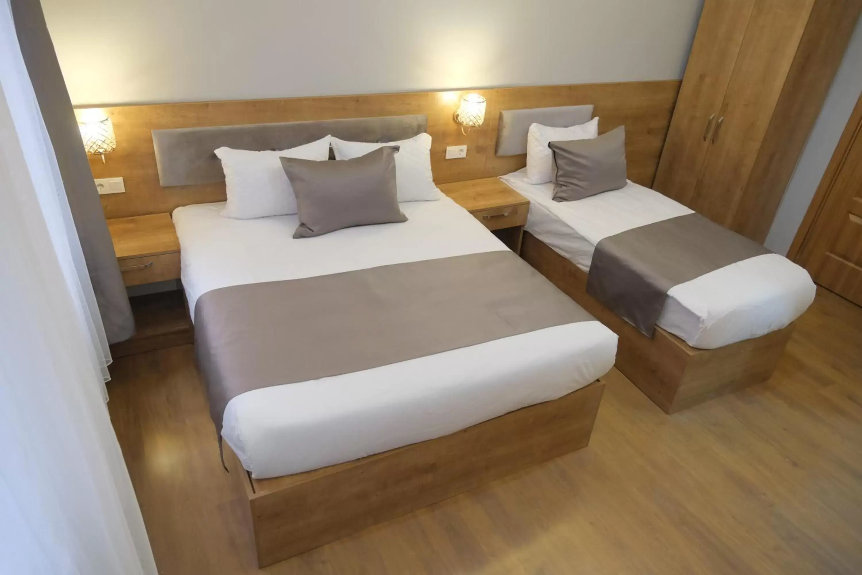 Bed in Adamantides Hotel Bed in Adamantides Hotel