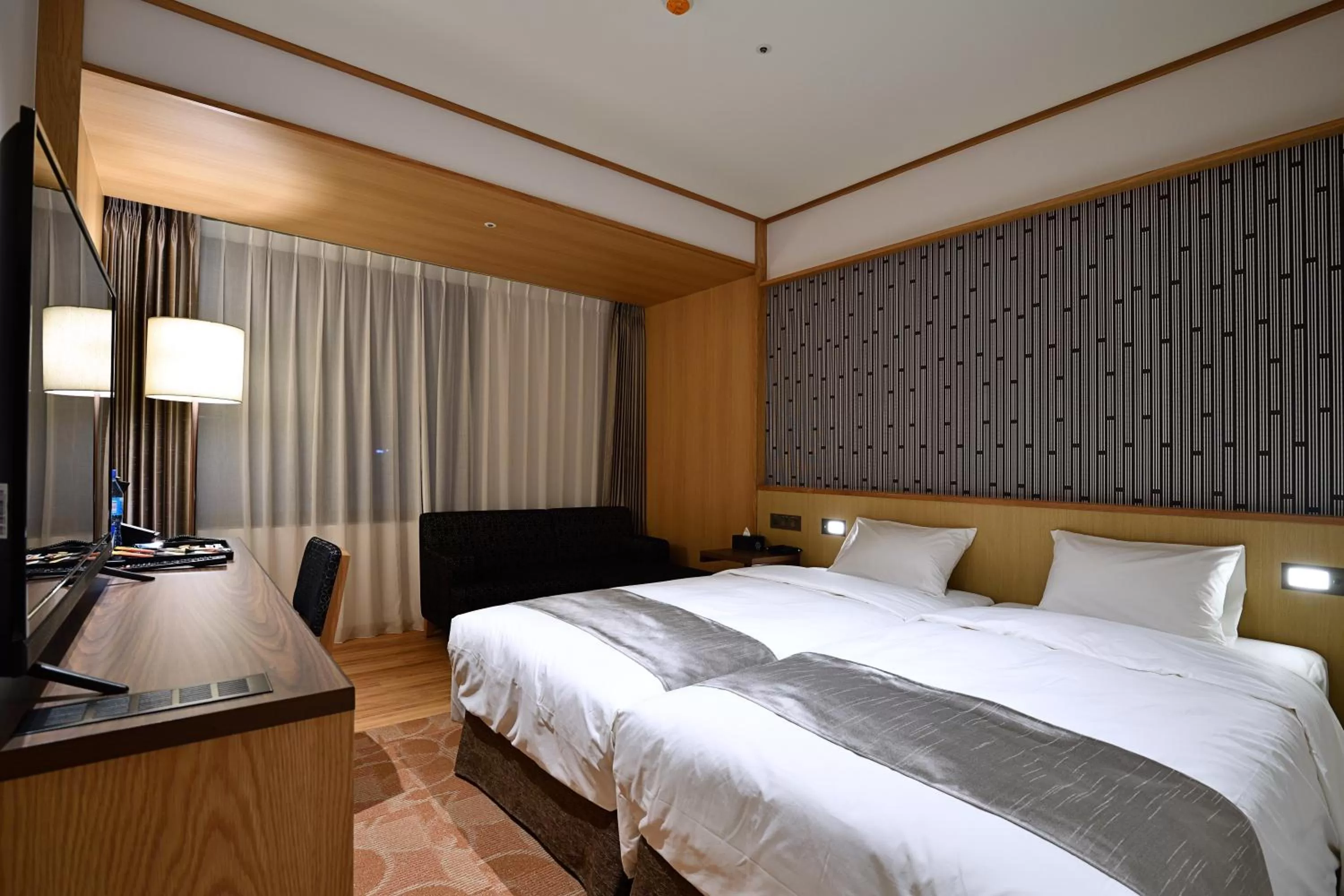 Bed in Hotel Gracery Taipei