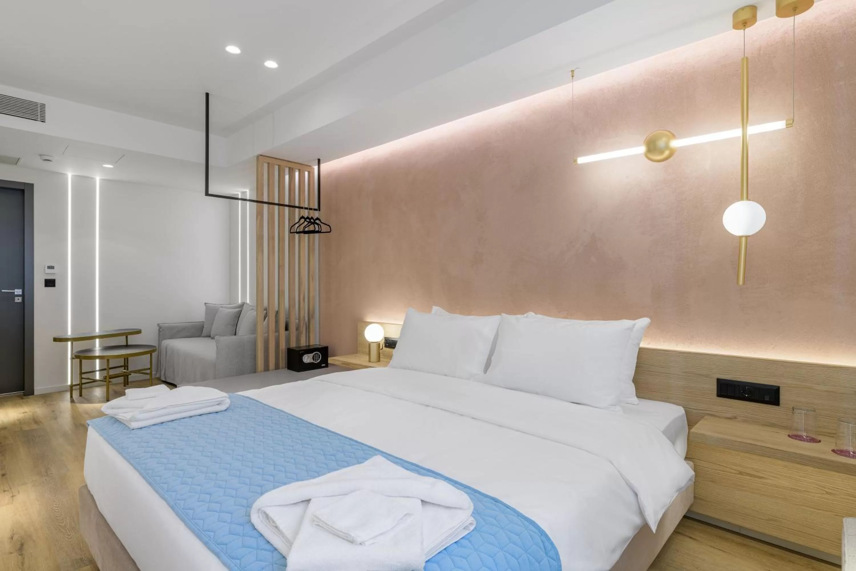Bed in Acropolis Magenta Luxury Suites