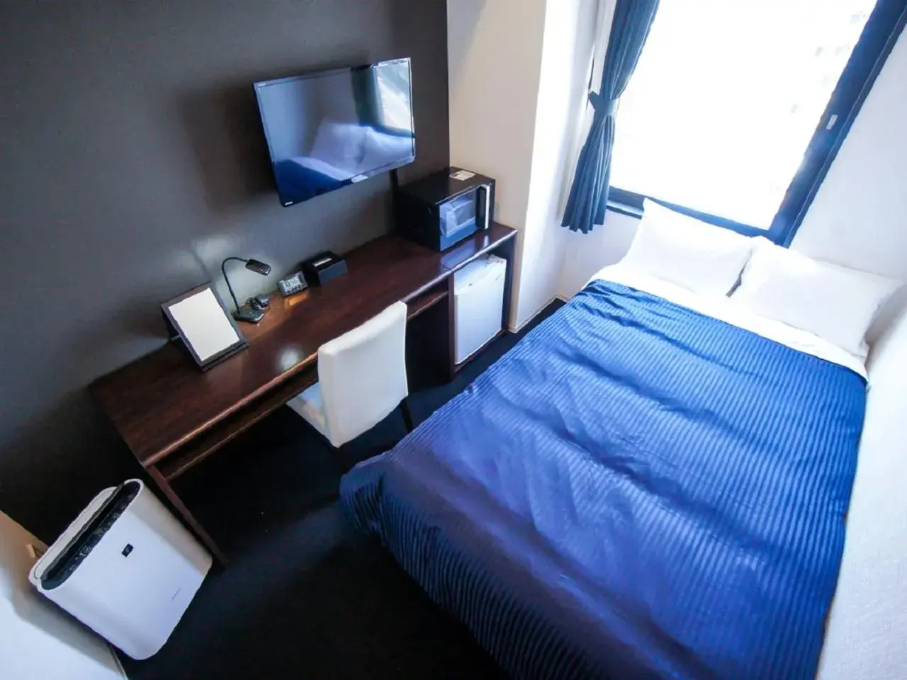 Bed in HOTEL LiVEMAX Tokyo Shiomi Ekimae