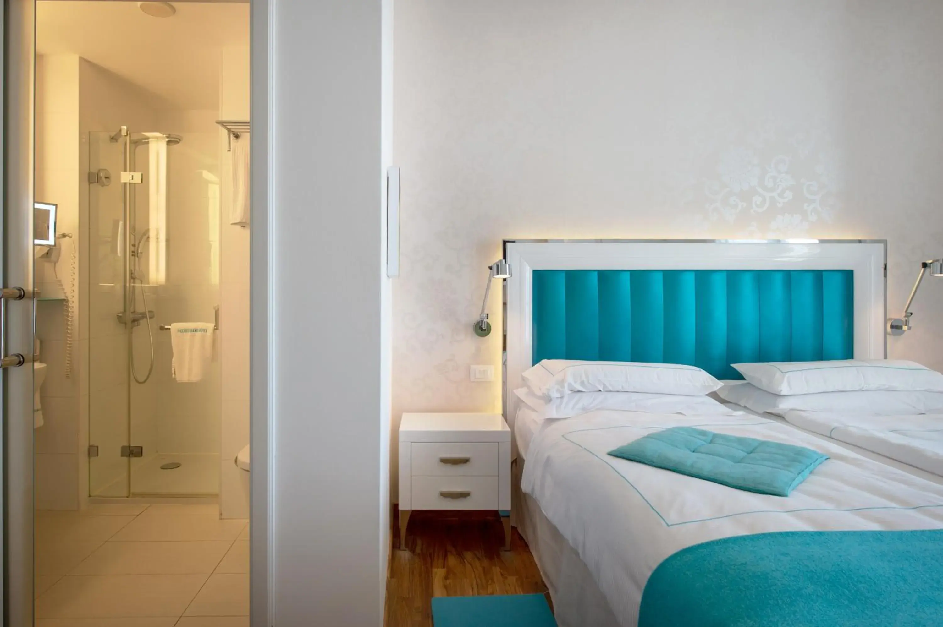 Photo of the whole room, Bed in Piccolo Grand Hotel Photo of the whole room, Bed in Piccolo Grand Hotel