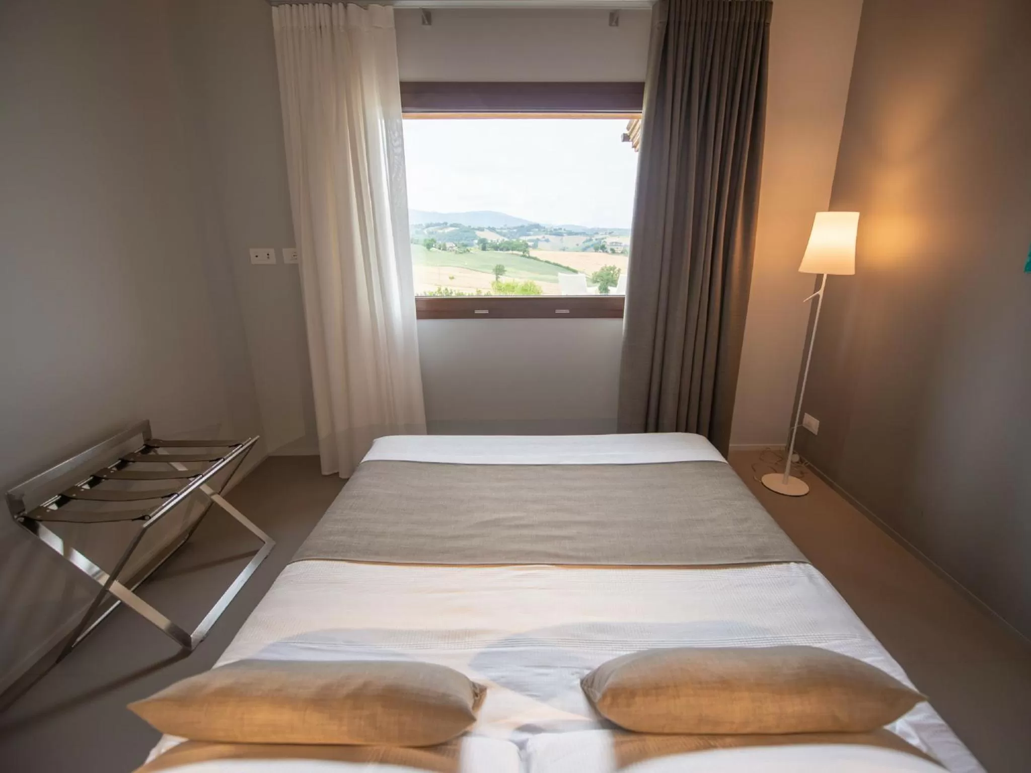 Photo of the whole room in Serre Alte Landscape Luxury Rooms