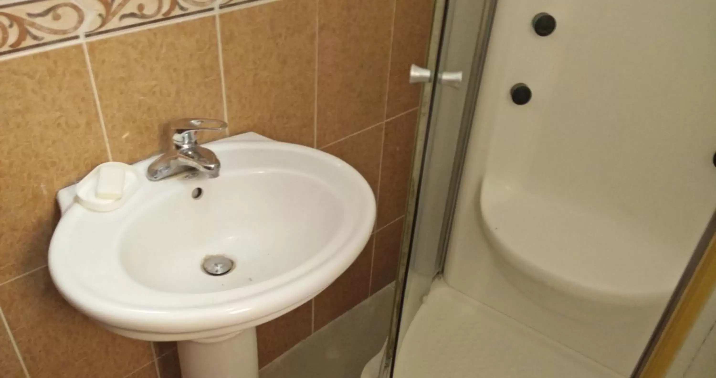 Decorative detail, Bathroom in White Sands shared apartments