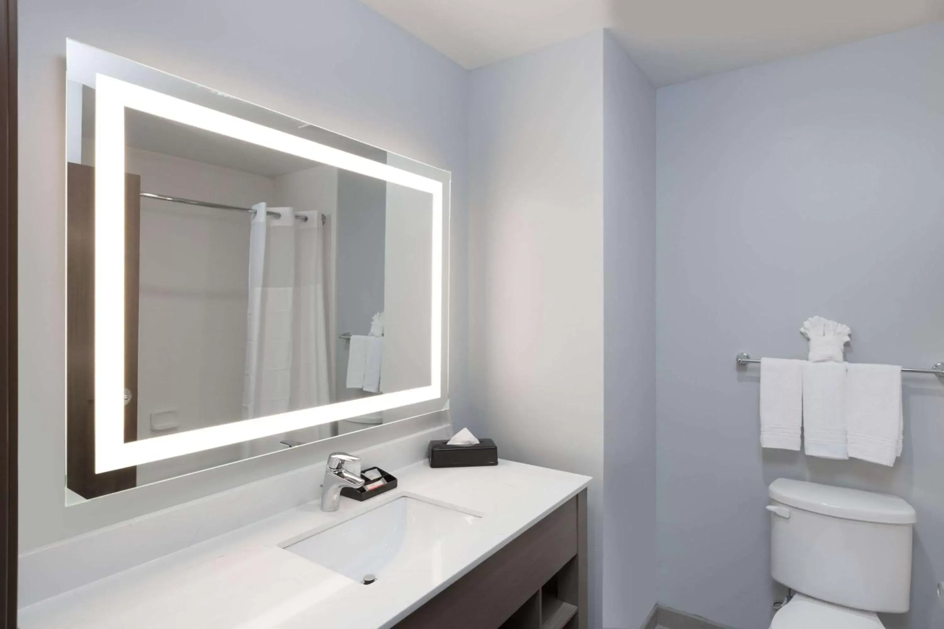 Bathroom in Days Inn & Suites by Wyndham Houston NW Cypress