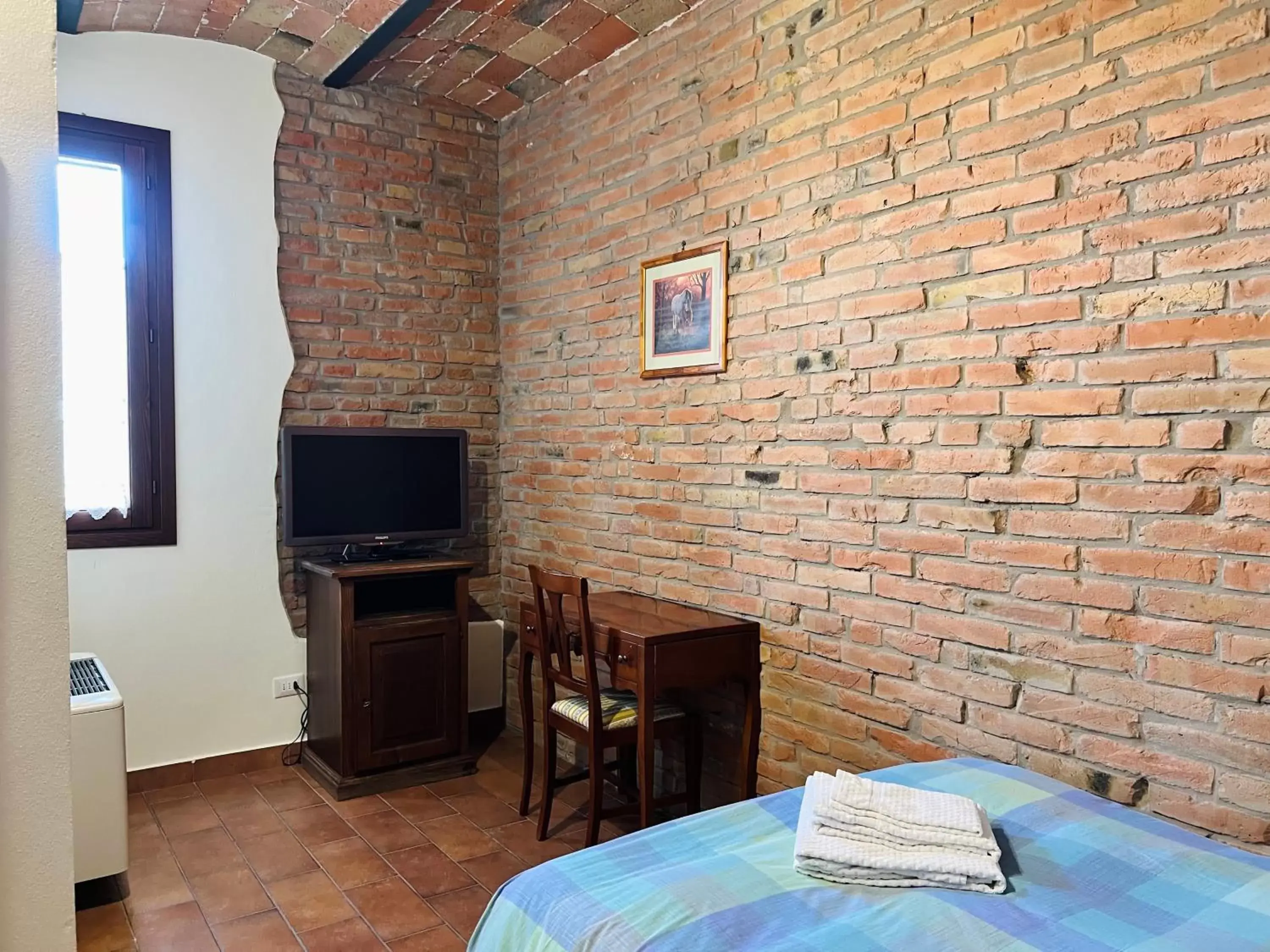 Photo of the whole room, TV/Entertainment Center in Agriturismo Sabidor