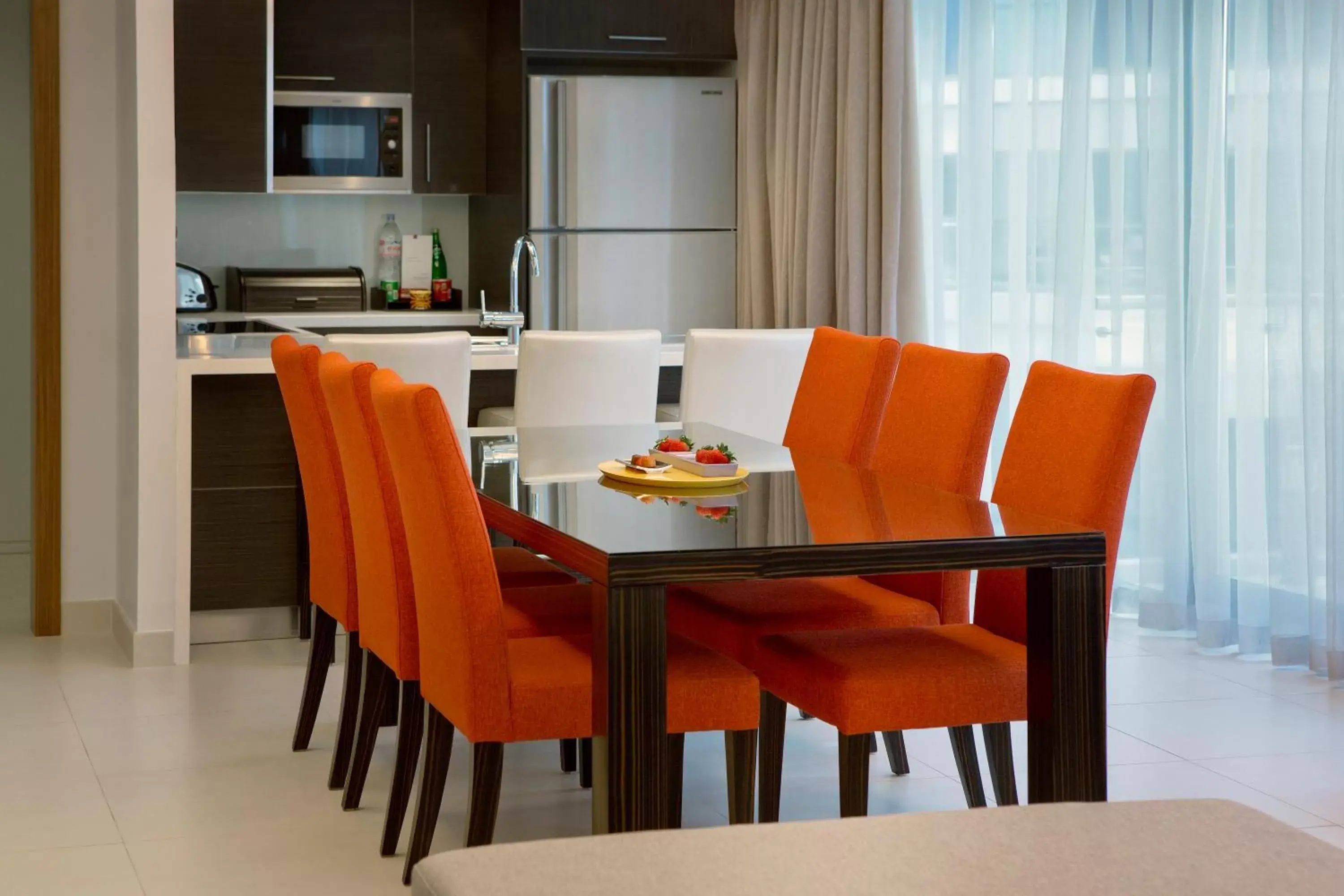 Kitchen or kitchenette, Dining Area in Majestic Arjaan by Rotana – Manama