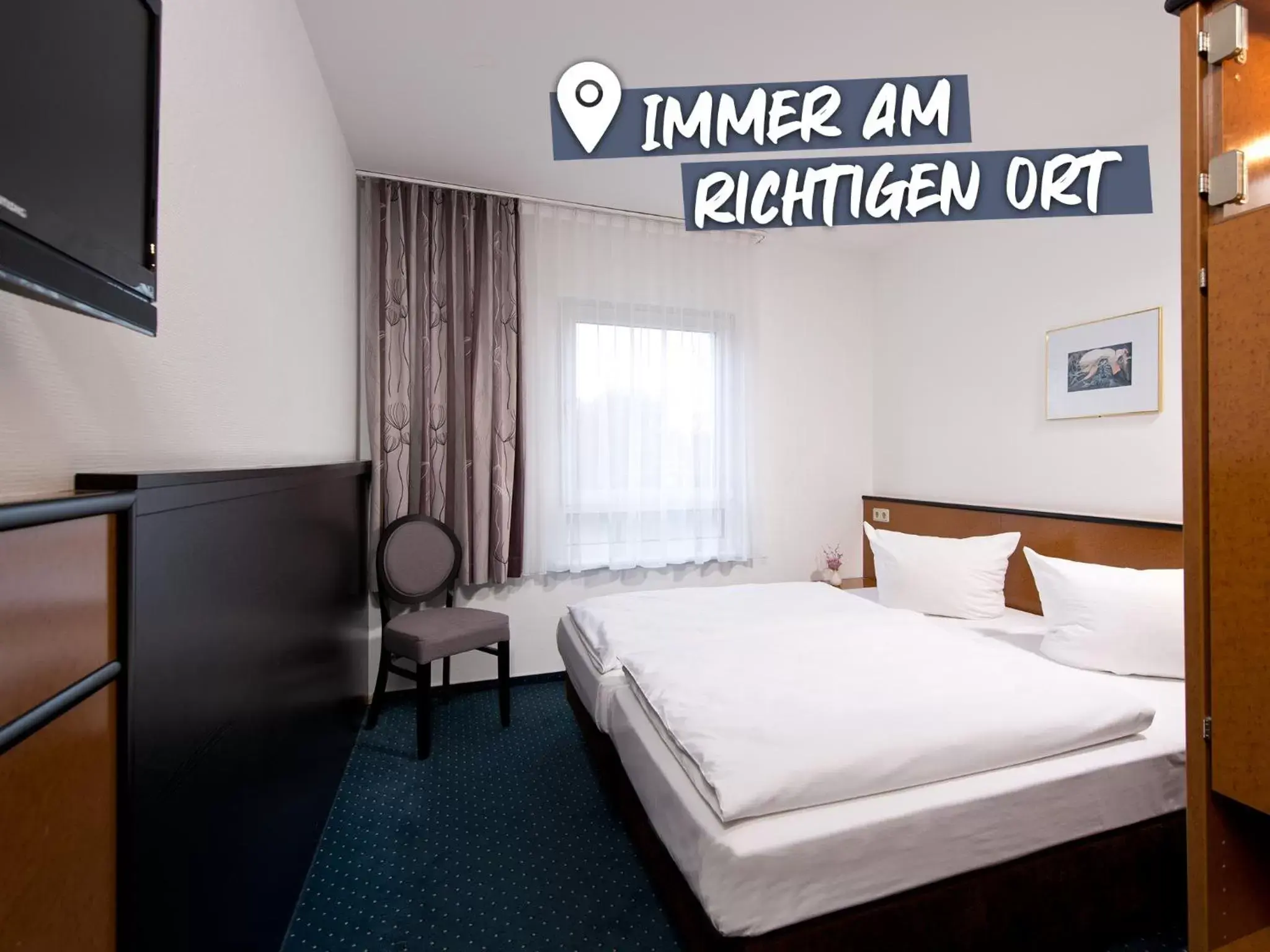 Bed in ACHAT Hotel Rüsselsheim Frankfurt