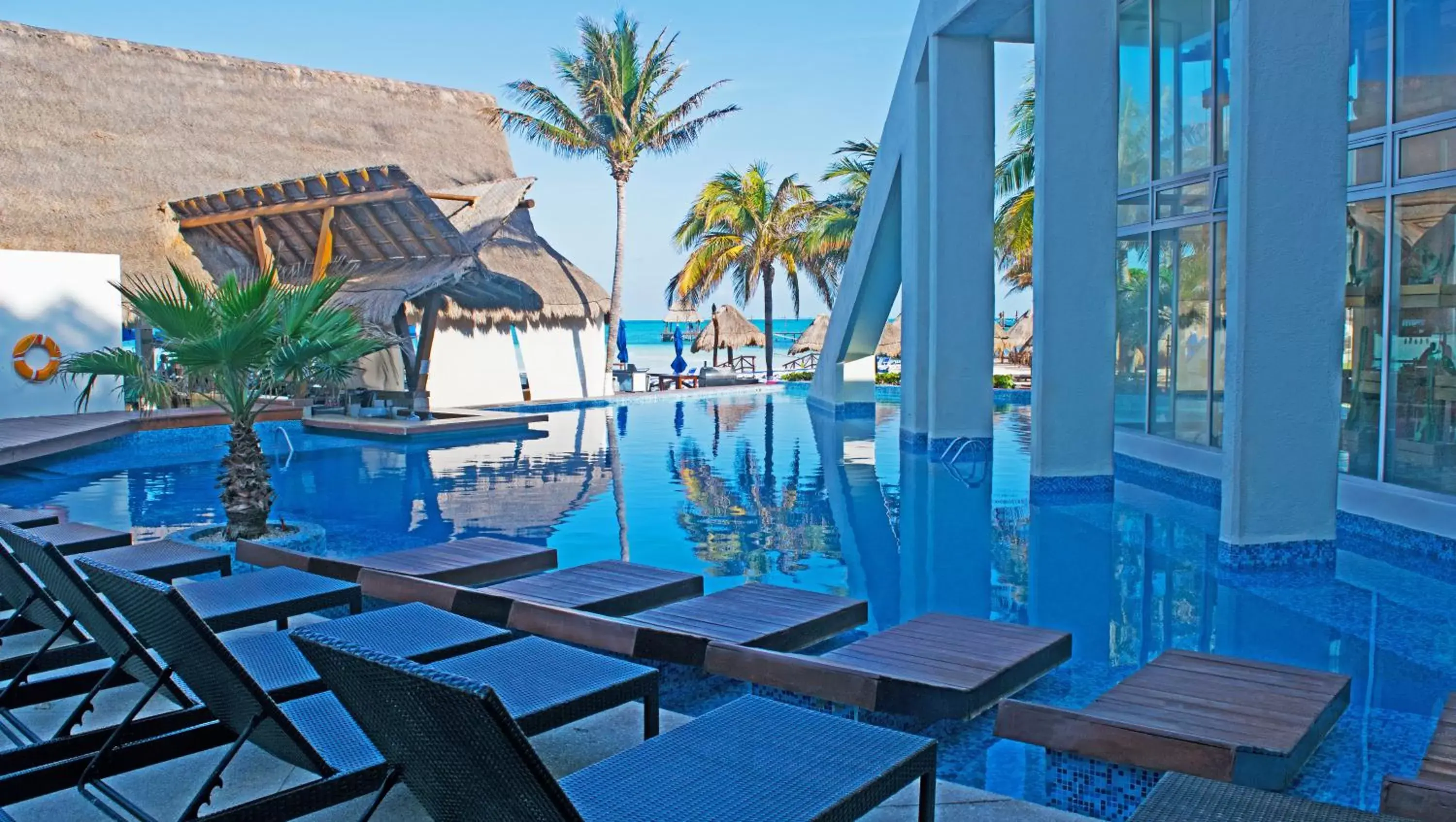 Swimming pool in Mia Reef Isla Mujeres Cancun All Inclusive Resort