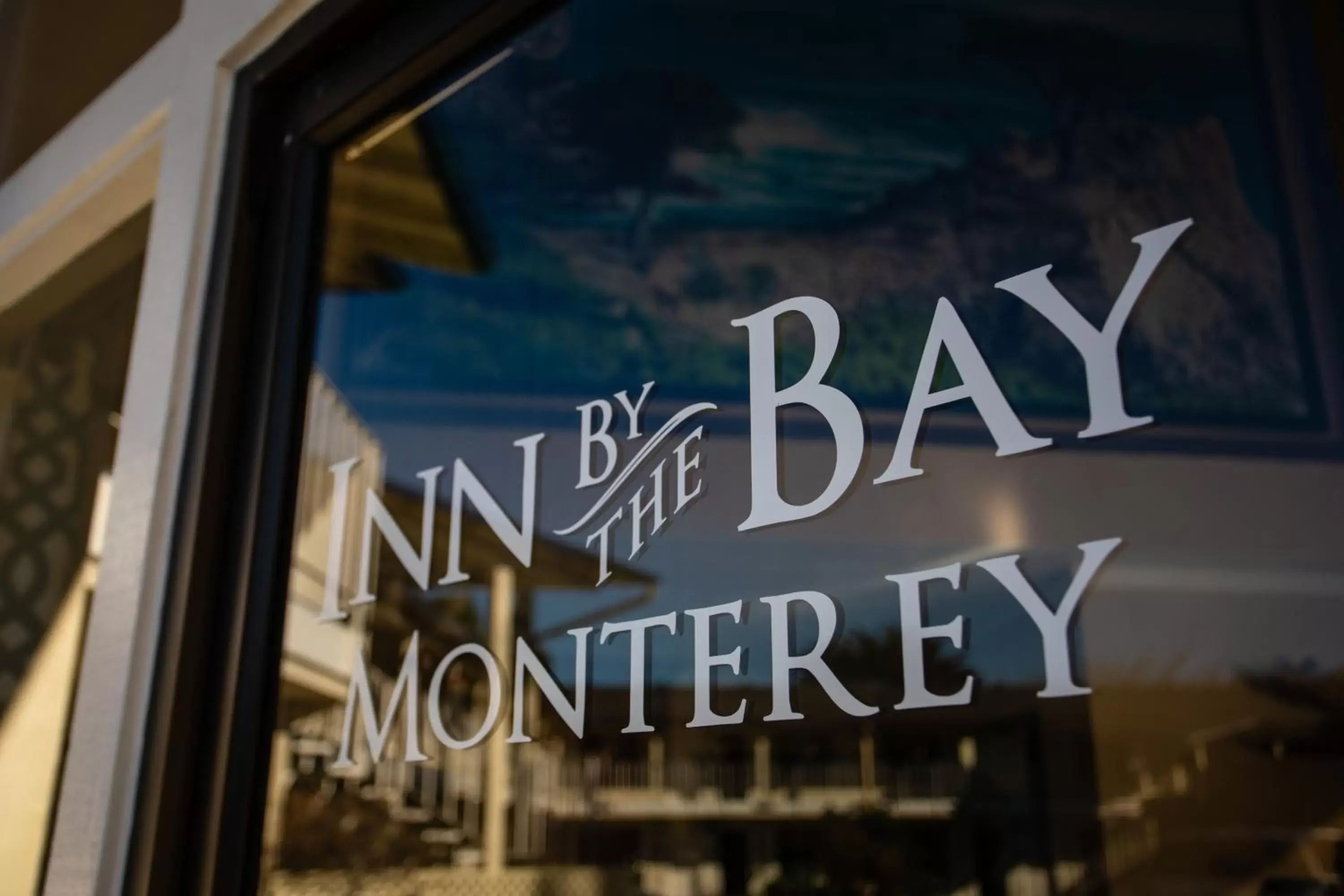 Property logo or sign in Inn By the Bay Monterey
