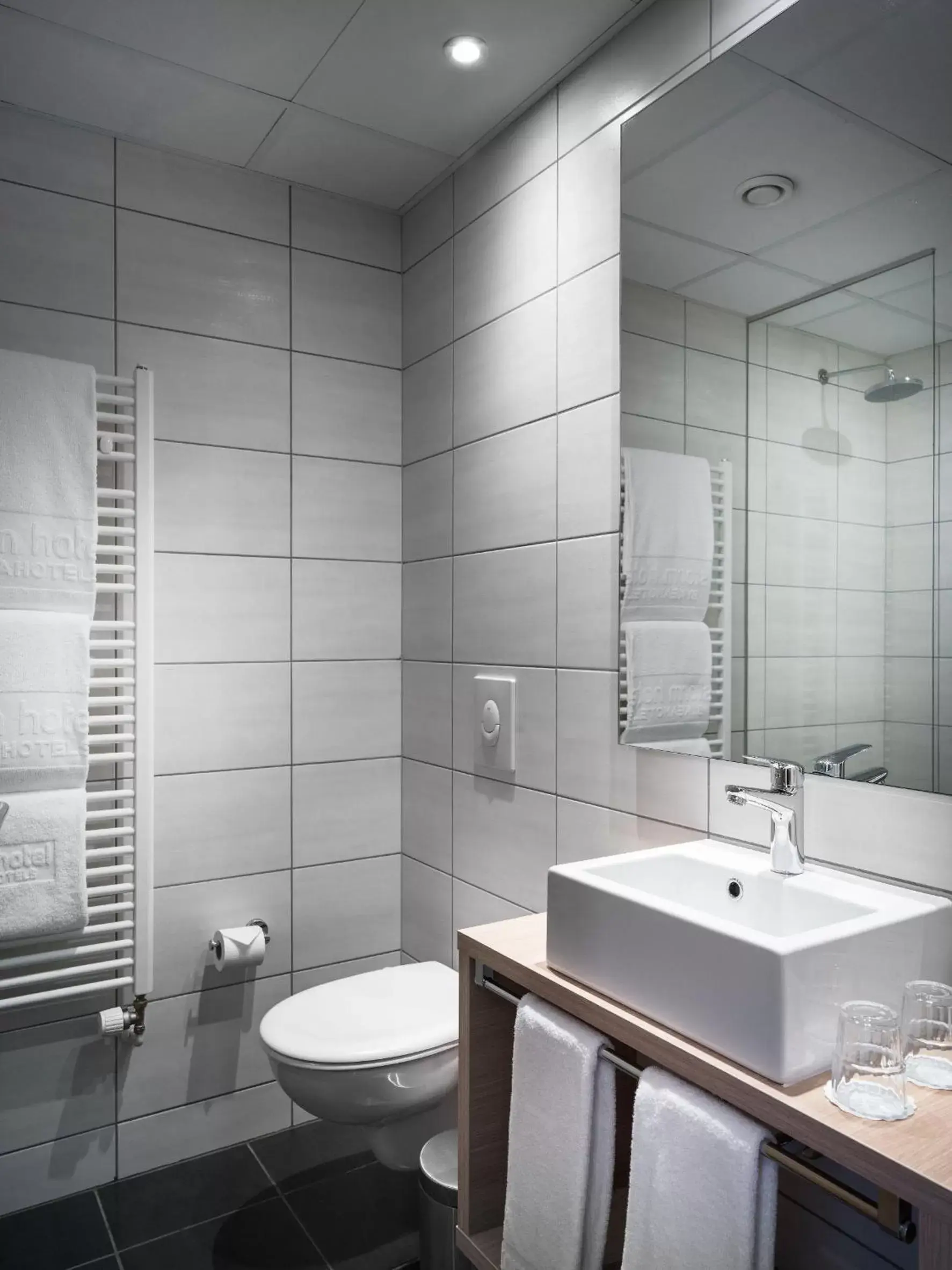 Property building, Bathroom in Storm Hotel by Keahotels