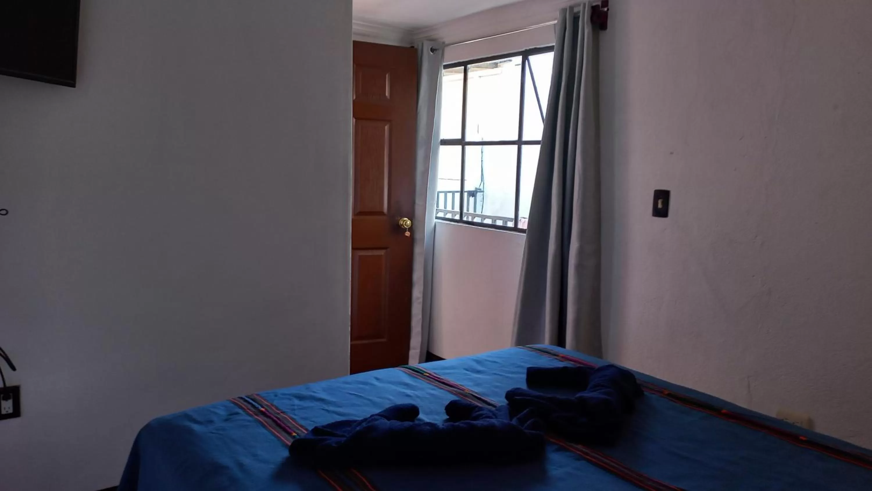 Photo of the whole room, Bed in Hospedaje el Viajero Antigua ll
