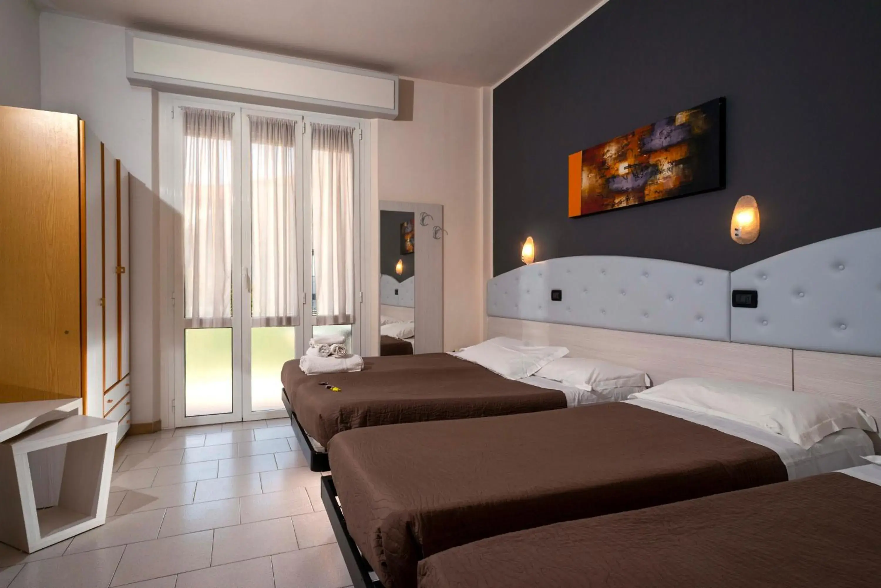 Bed in Hotel Petrarca