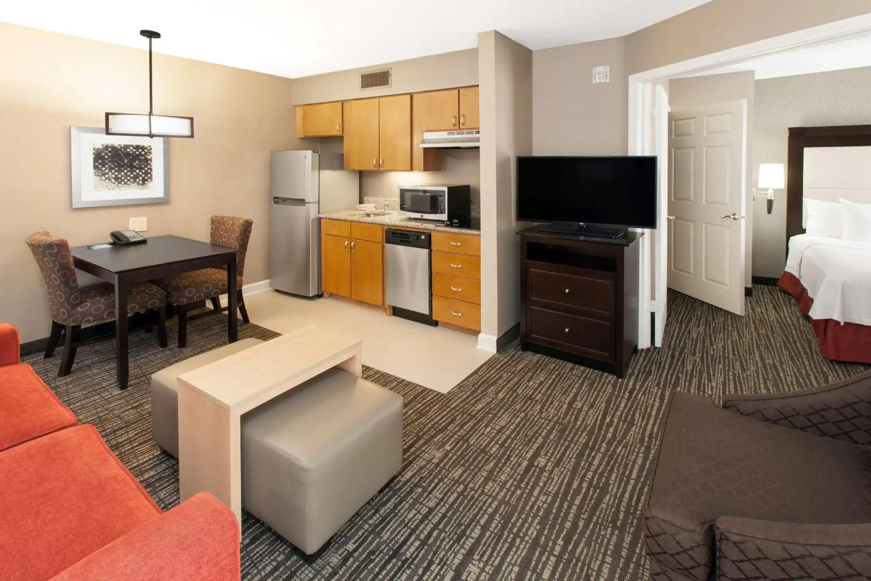 Bedroom, TV/Entertainment Center in Homewood Suites by Hilton Indianapolis At The Crossing